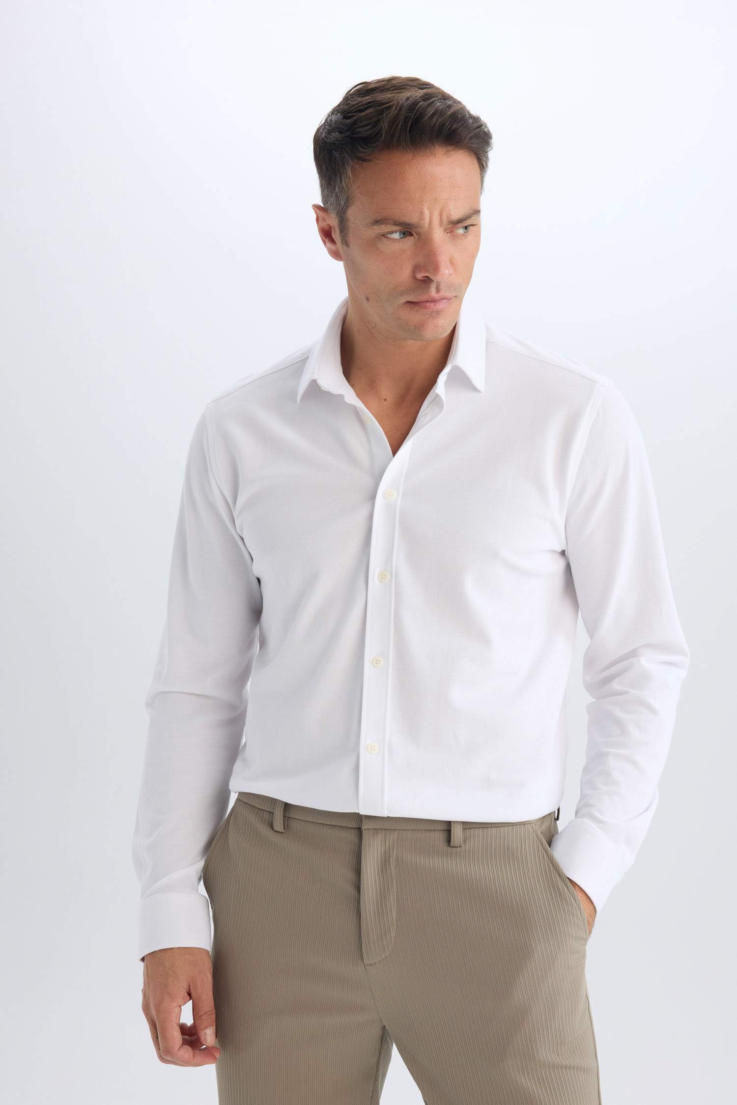 قميص بولو كم طويل محبوك قصة عادية