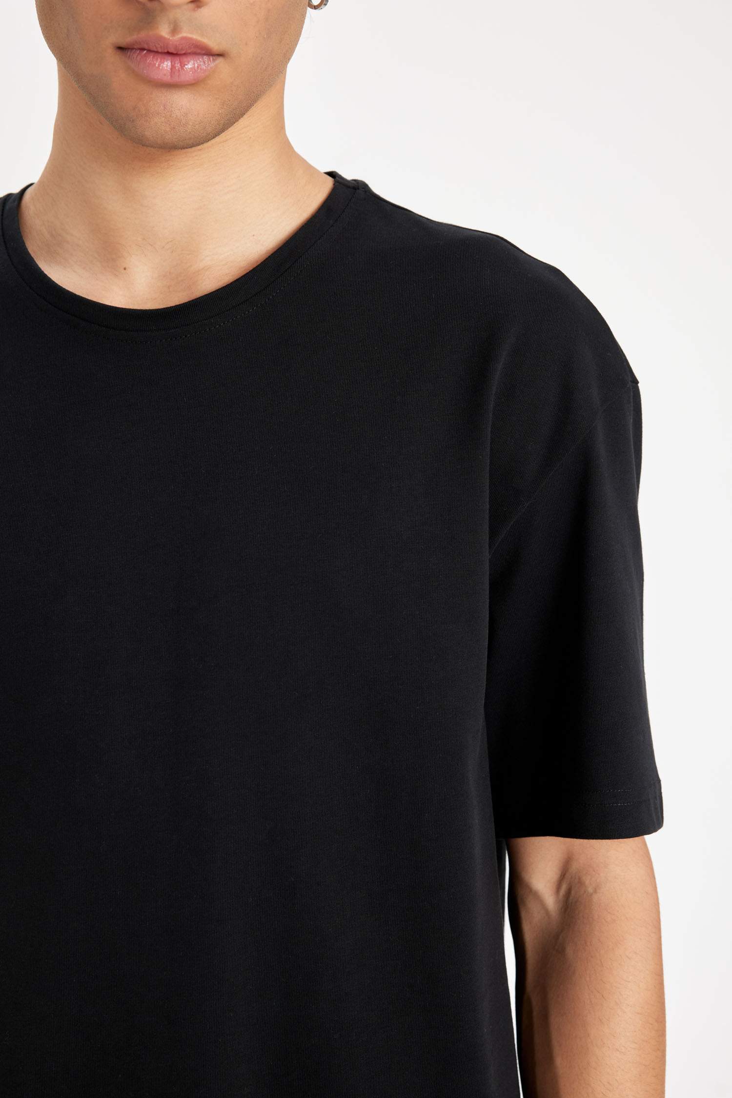 تي شيرت أوفر سايز بياقة مستديرة