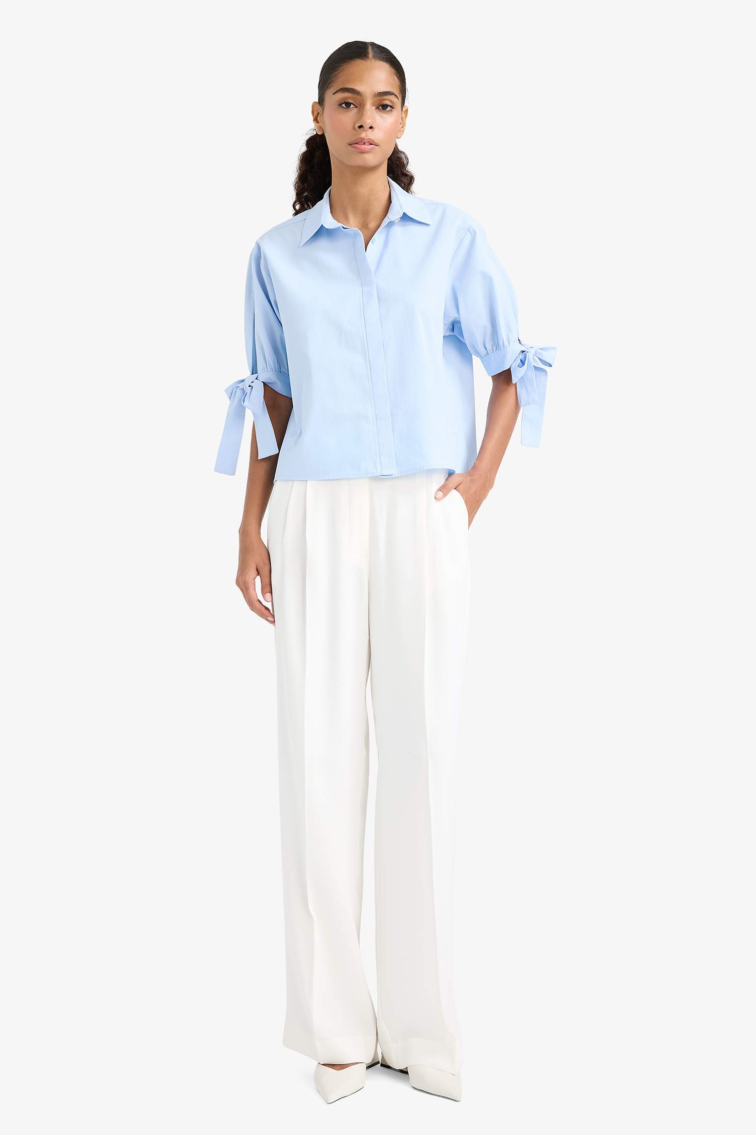 Pantalon droit taille haute à jambes larges avec poches en crêpe