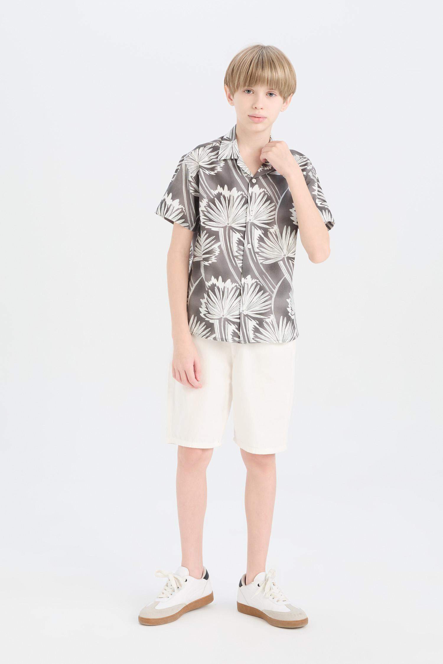 قميص بولو اولادي رمادي نص كم اوفر سايز