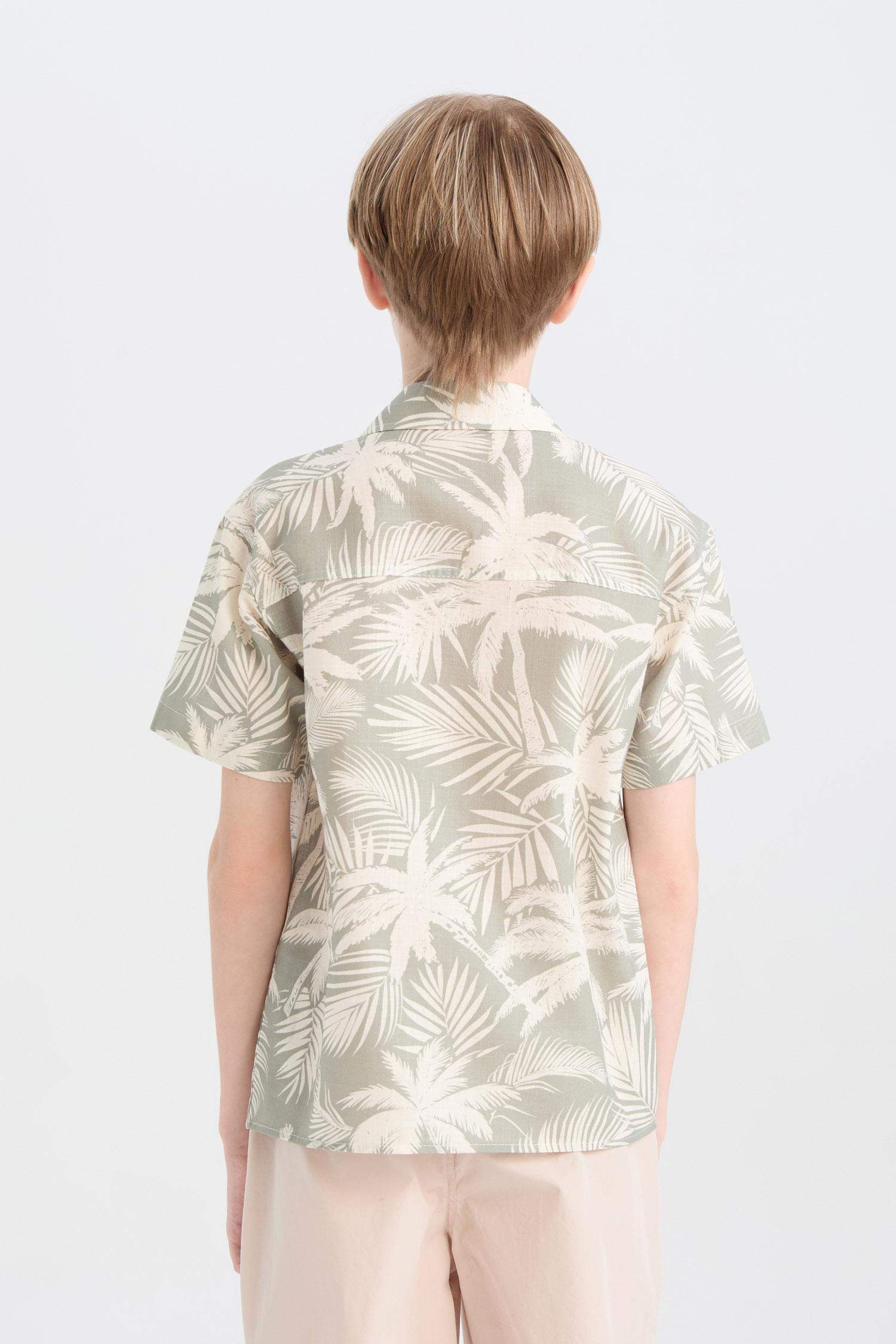 قميص بولو ولادي اوفر سايز نص ردن بطبعة نخيل