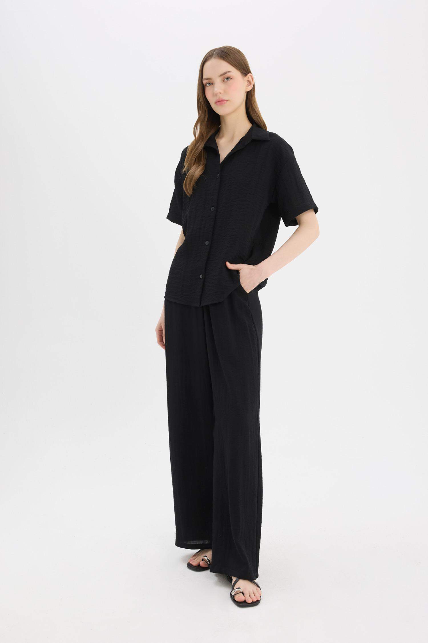 Pantalon large à taille normale avec poches