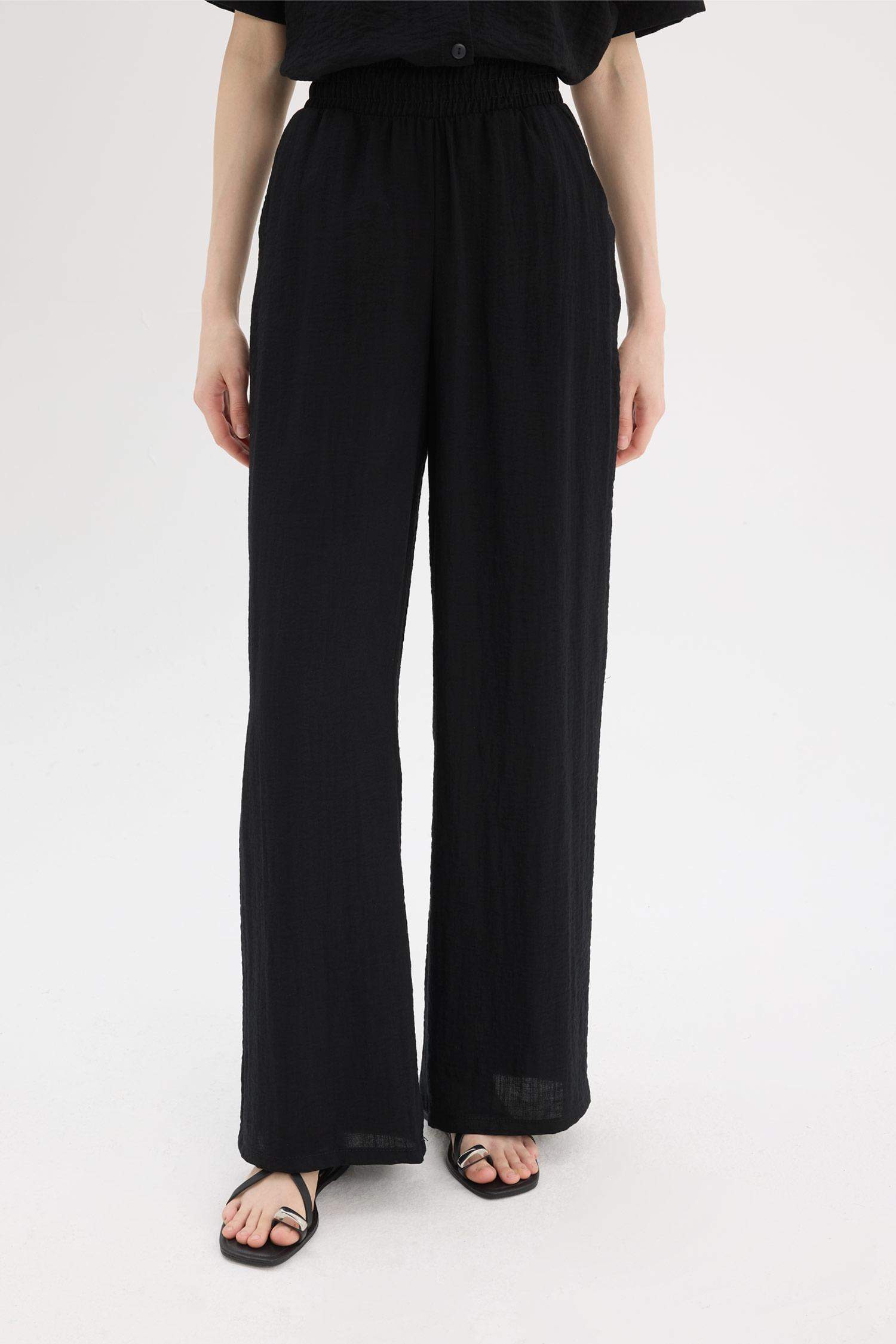 Pantalon large à taille normale avec poches