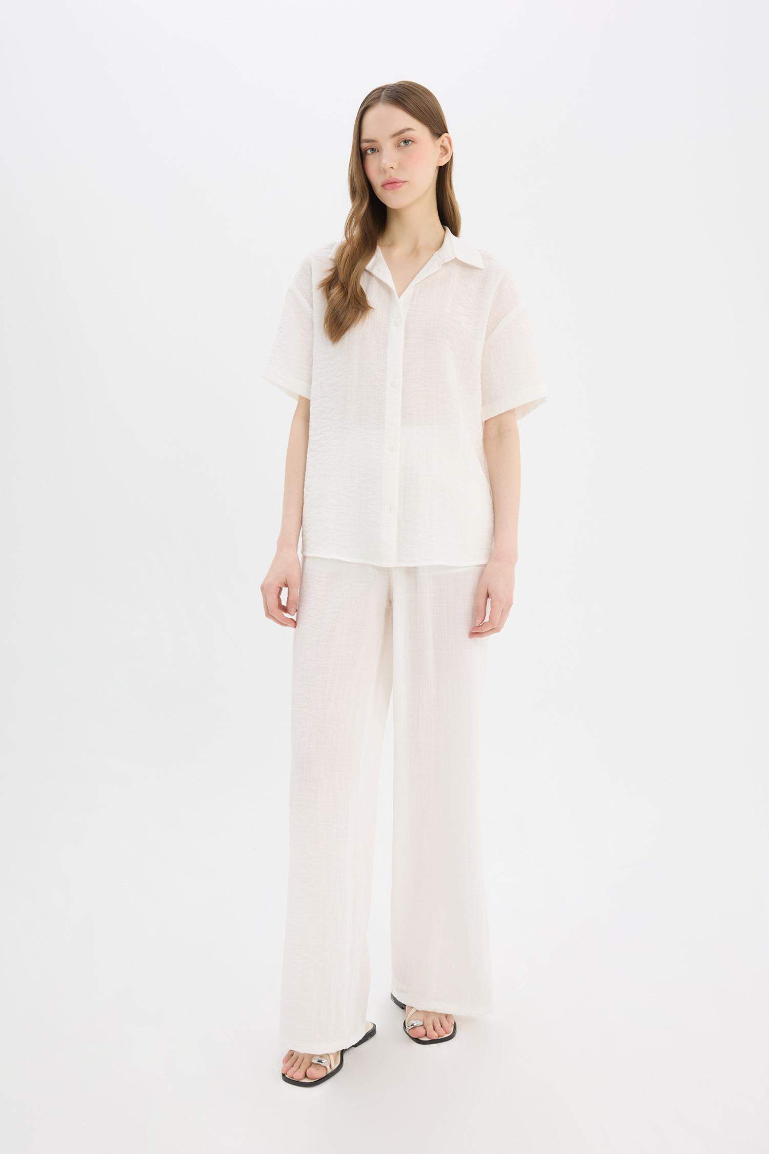 Pantalon large taille normale avec poches doublées à coupe standard