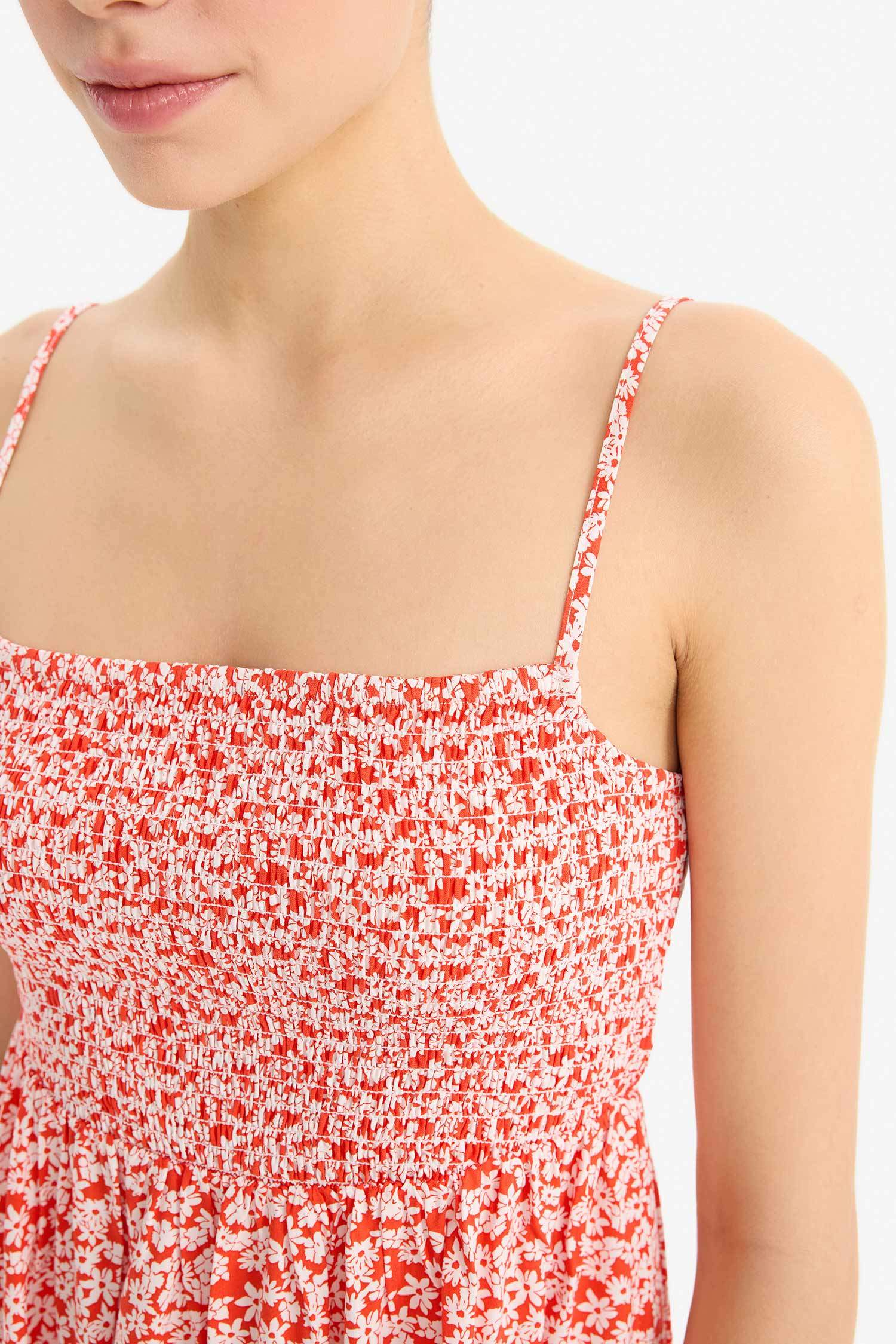 Облегающее мини-платье с цветочным рисунком и шлейками