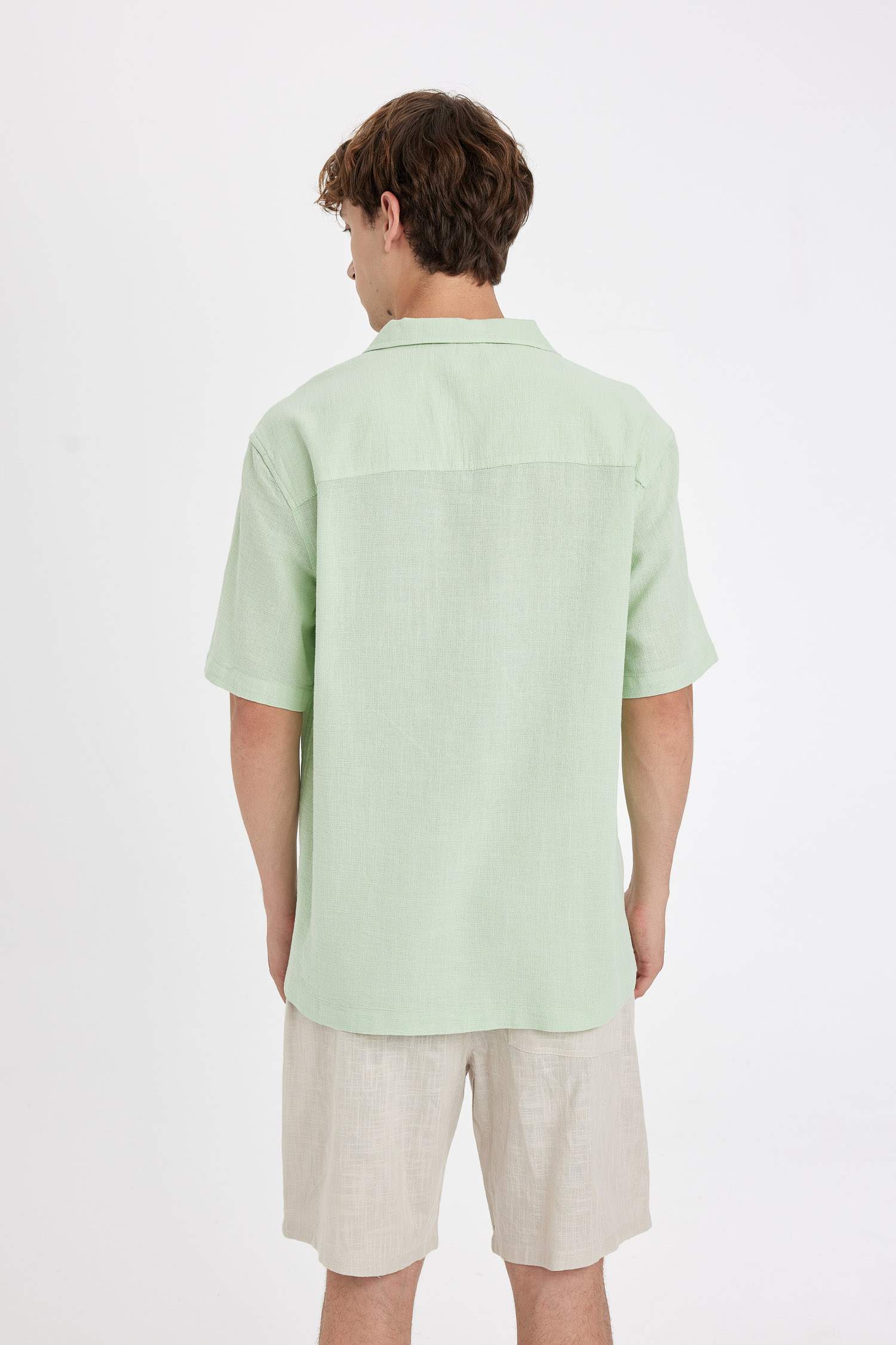 قميص قطن قصة مريحة بياخة عالية