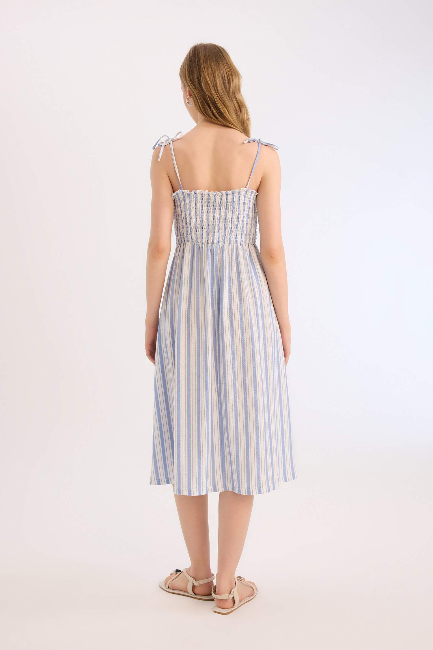 فستان نص كم ميدي مخطط بحمالات