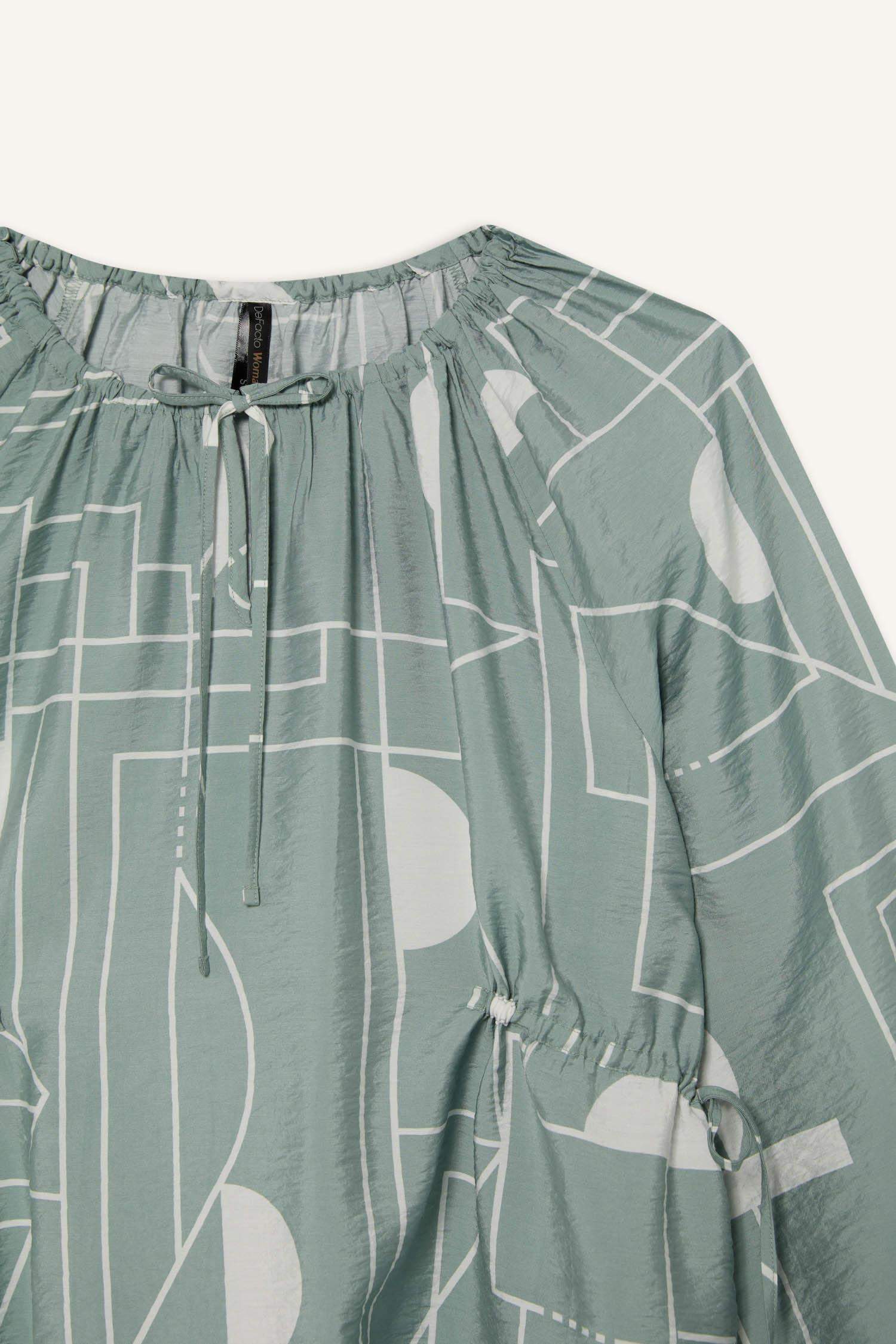 بلوزة ردن طويل قصة عادية