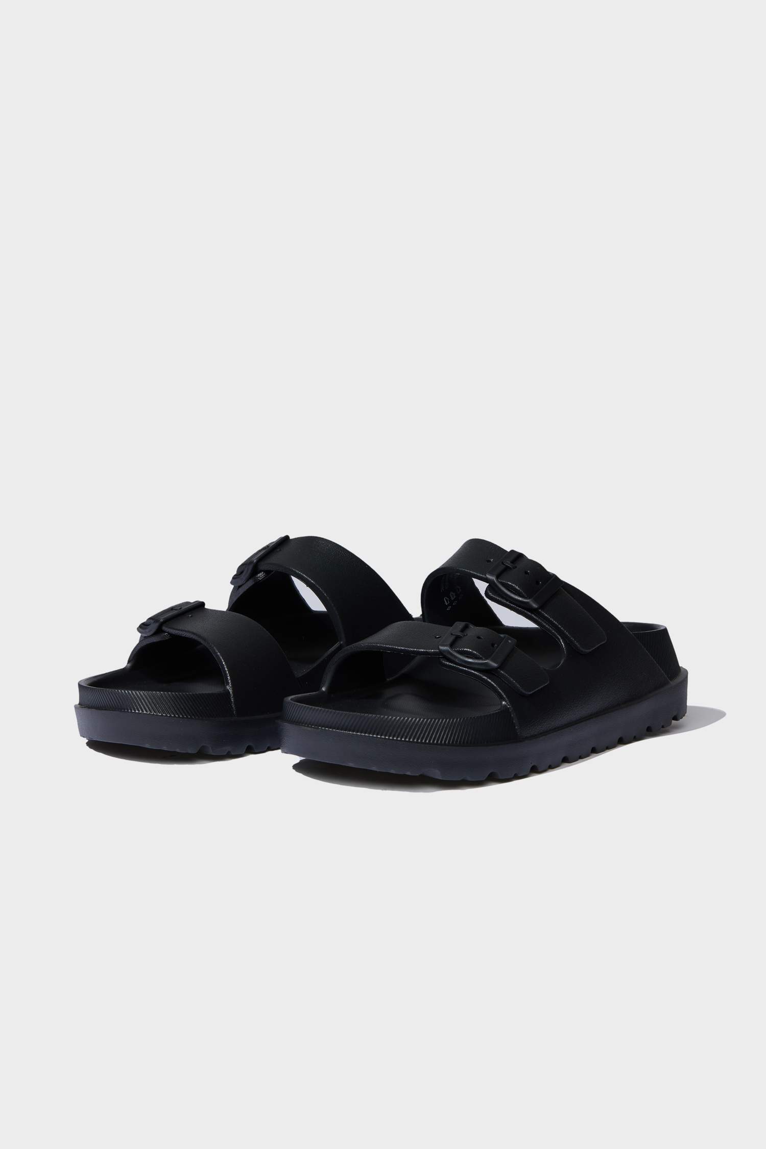 شبشب حريمي إيفا أسود بكعب مسطح بشريط مزدوج