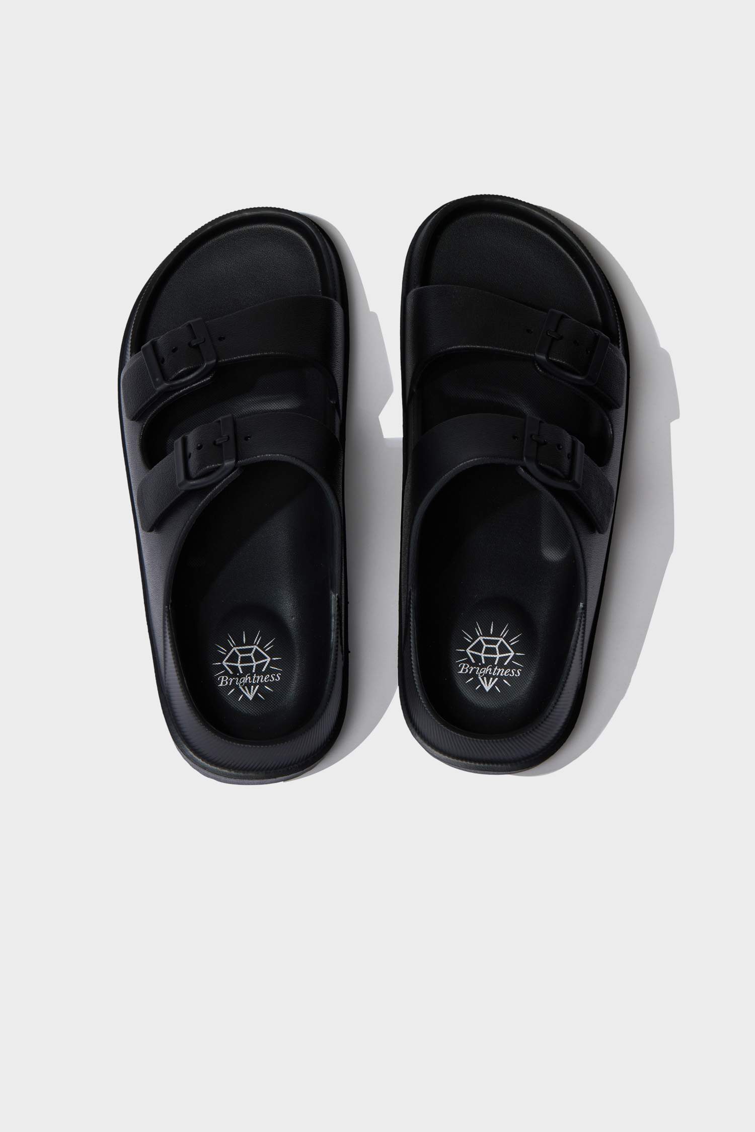 شبشب حريمي إيفا أسود بكعب مسطح بشريط مزدوج