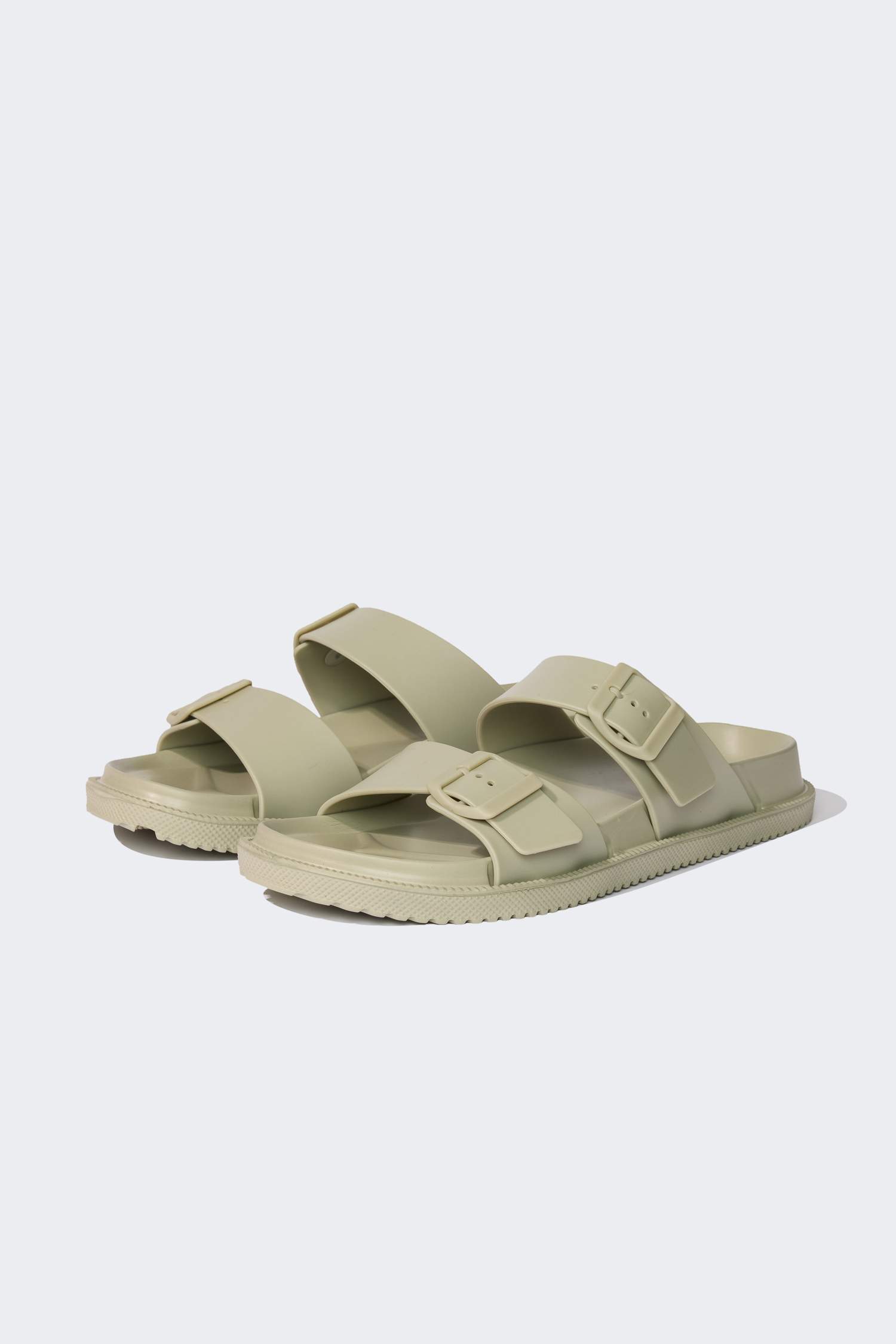 شبشب نسائي جلد صناعي بكعب مسطح