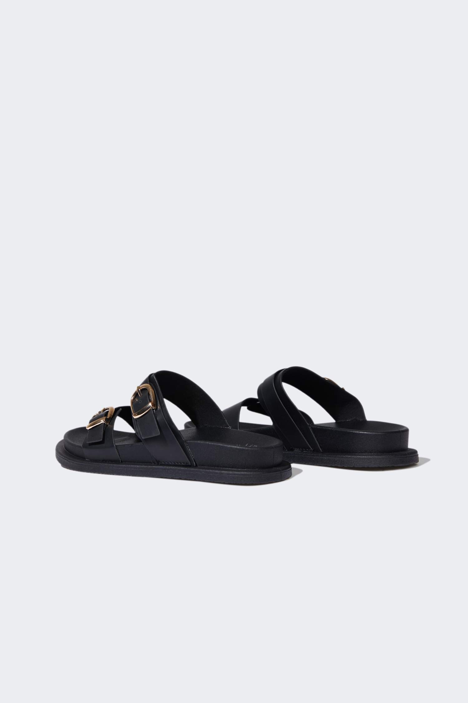 شبشب نسائي جلد صناعي بكعب مسطح