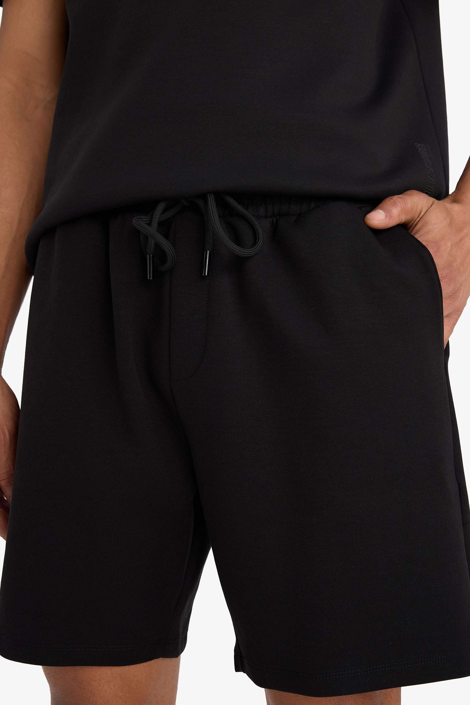 شورت رياضي قصة عادية مطبوع بسحاب من DeFactoFit