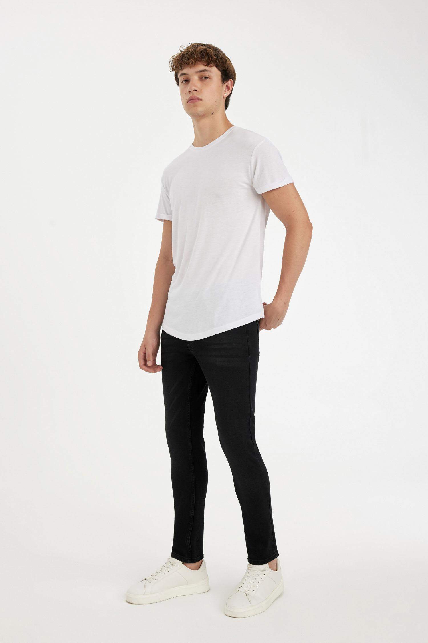 Pantalon Jean extra slim à taille normale et jambes extra étroites