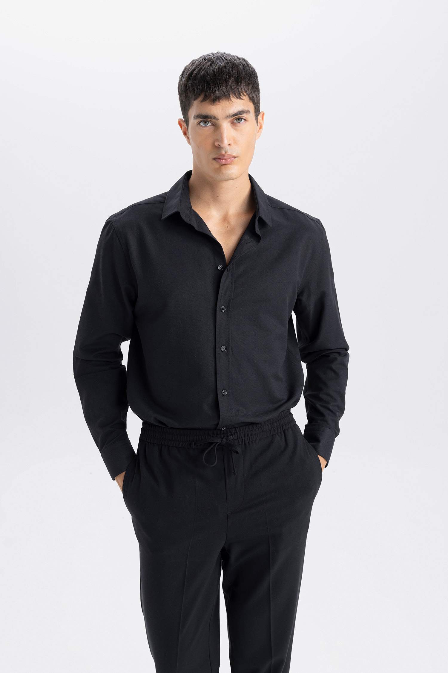 قميص بولو ردن طويل مودرن فيت