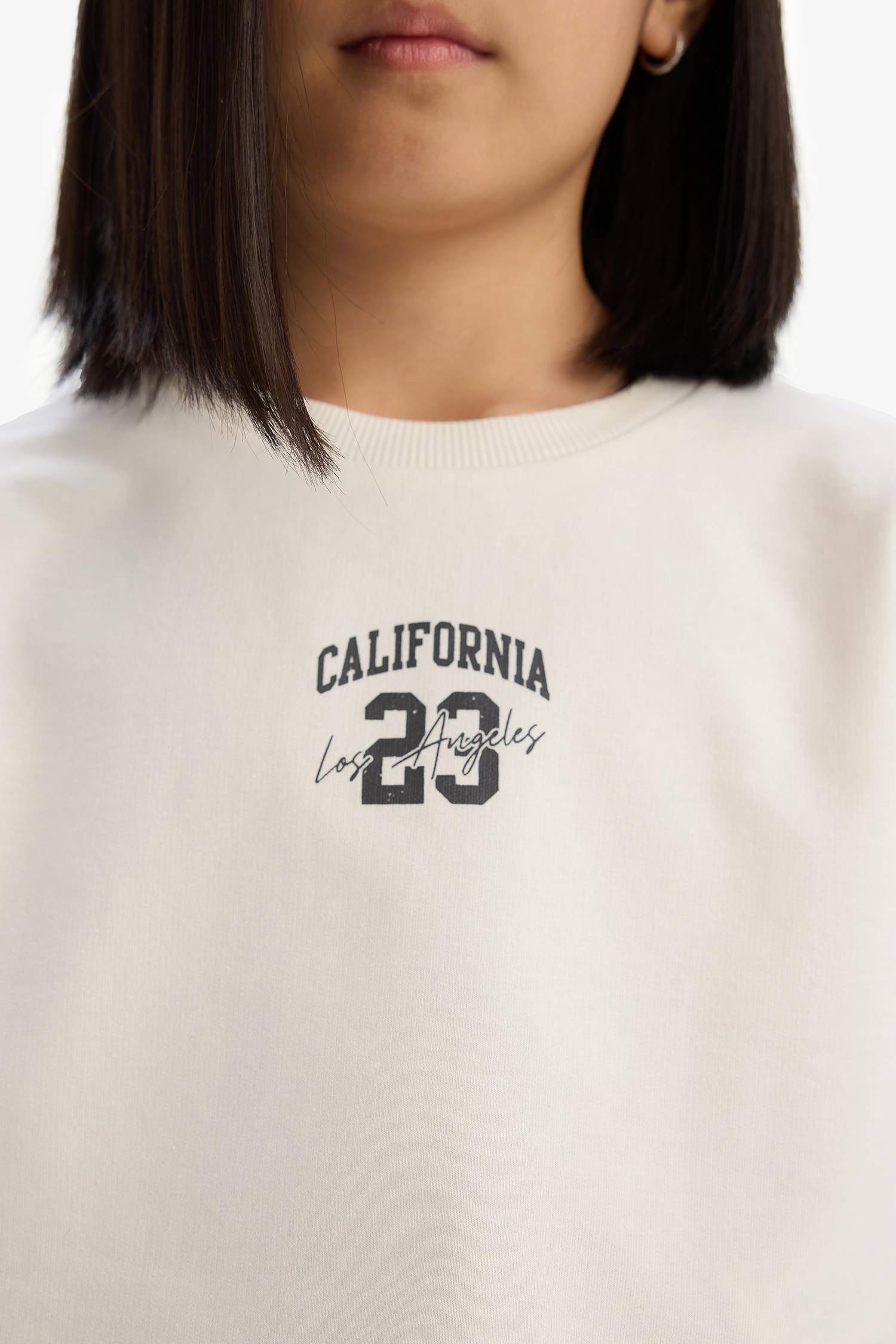 طقم بنات من تيشيرت مطبوع و شورت