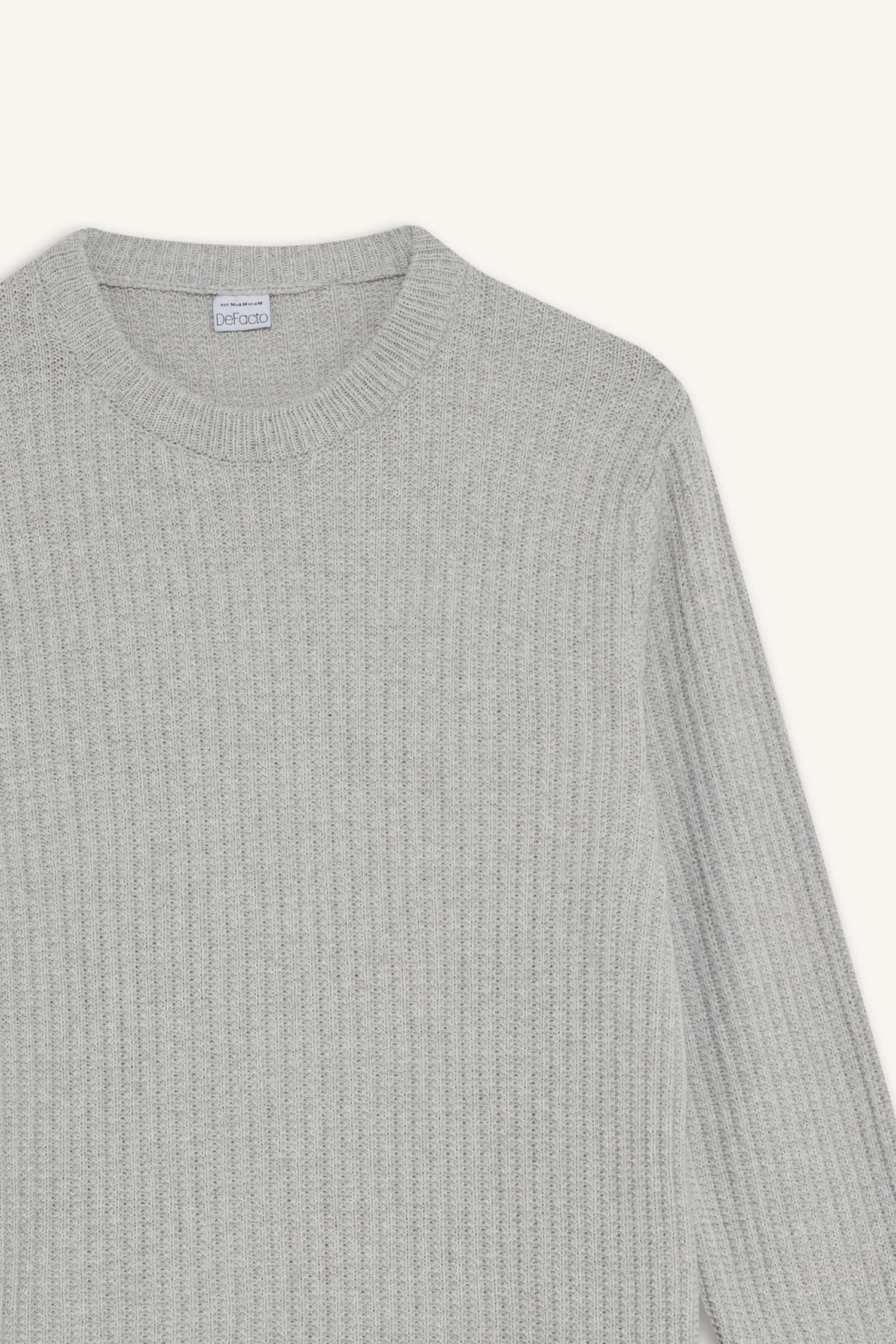 بلوز تريكو قصة عادية بياخة مستديرة