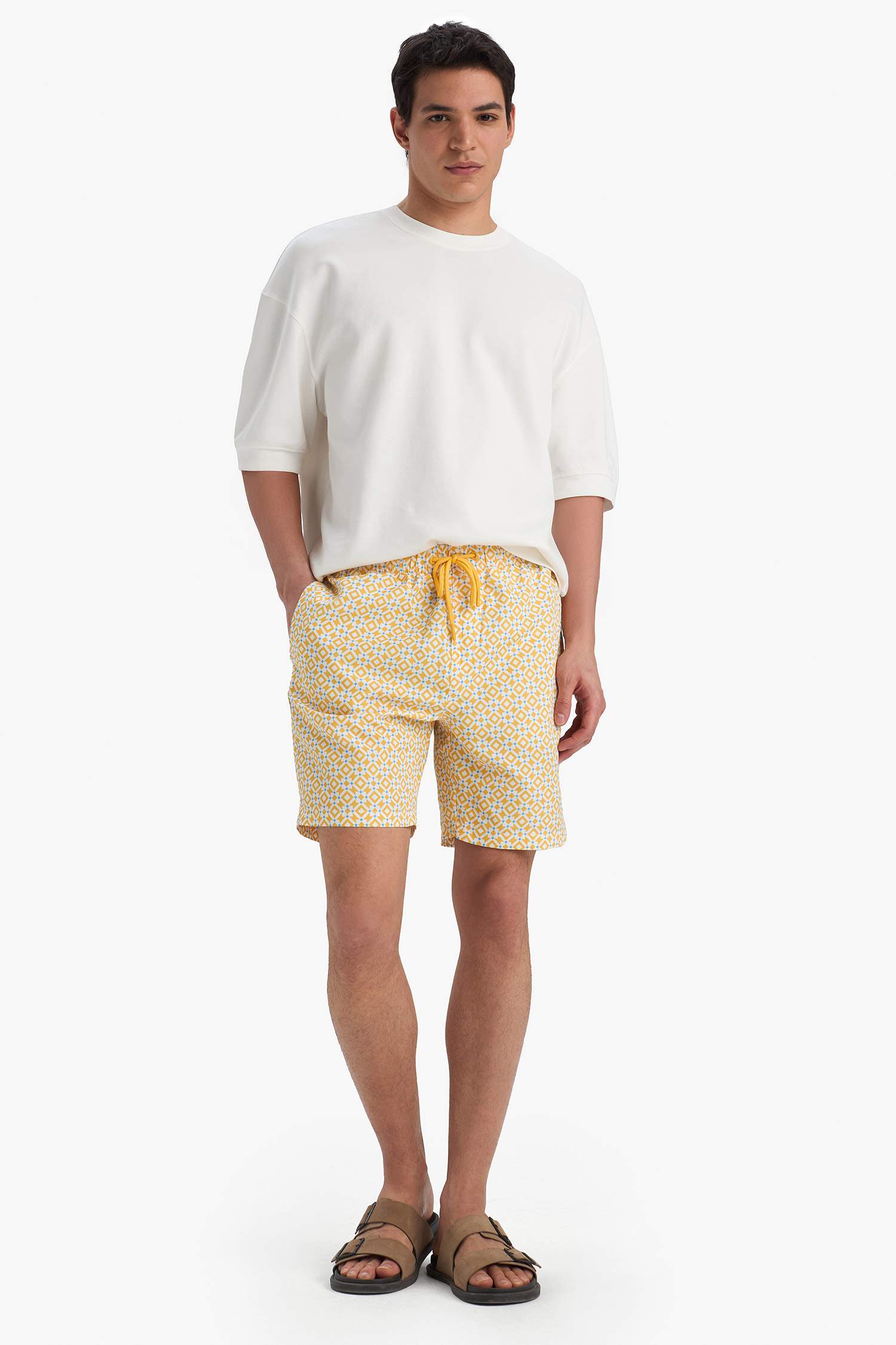 Short de bain mi-long à motifs avec doublure en filet Coupe régulière