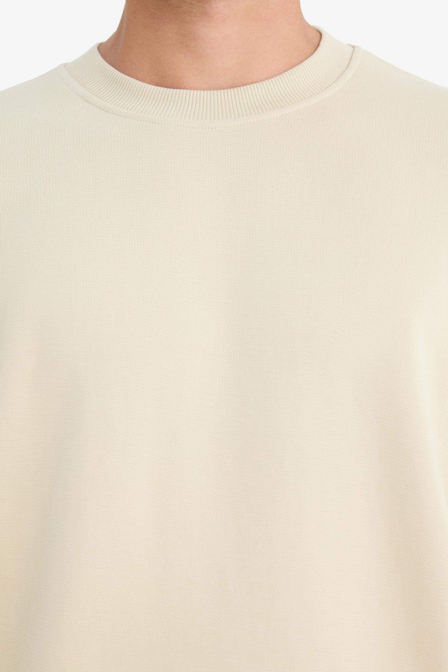 سويت شيرت اوفر سايز بيكيه بياخة مستديرة