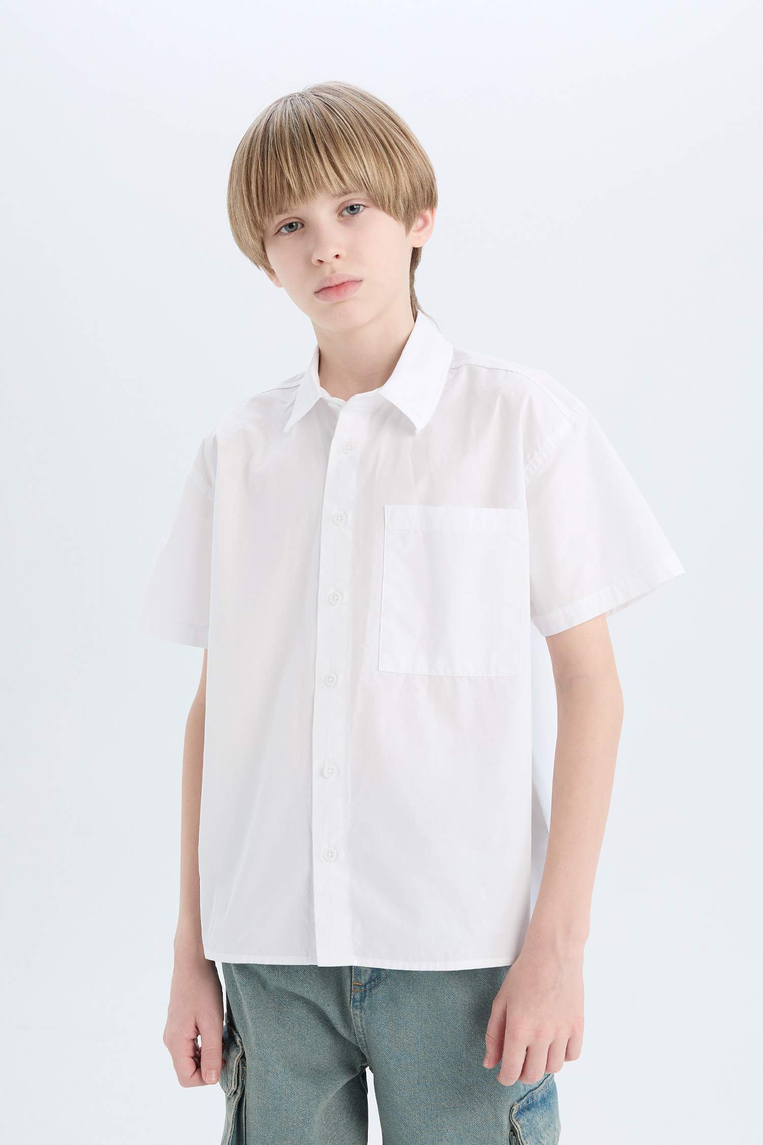 قميص بولو اولادي باراشوت نص كم اوفر سايز