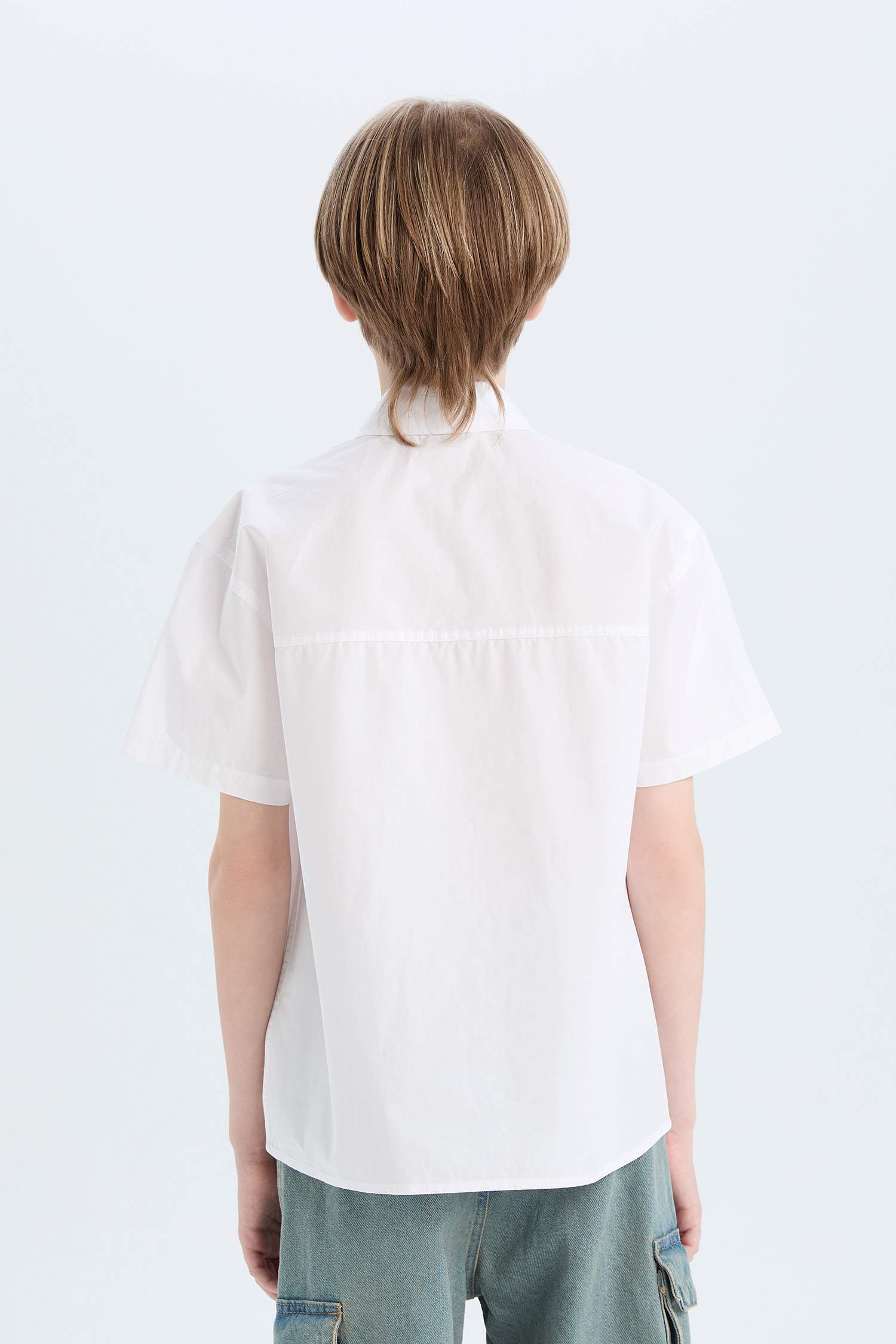 قميص بولو اولادي باراشوت نص كم اوفر سايز