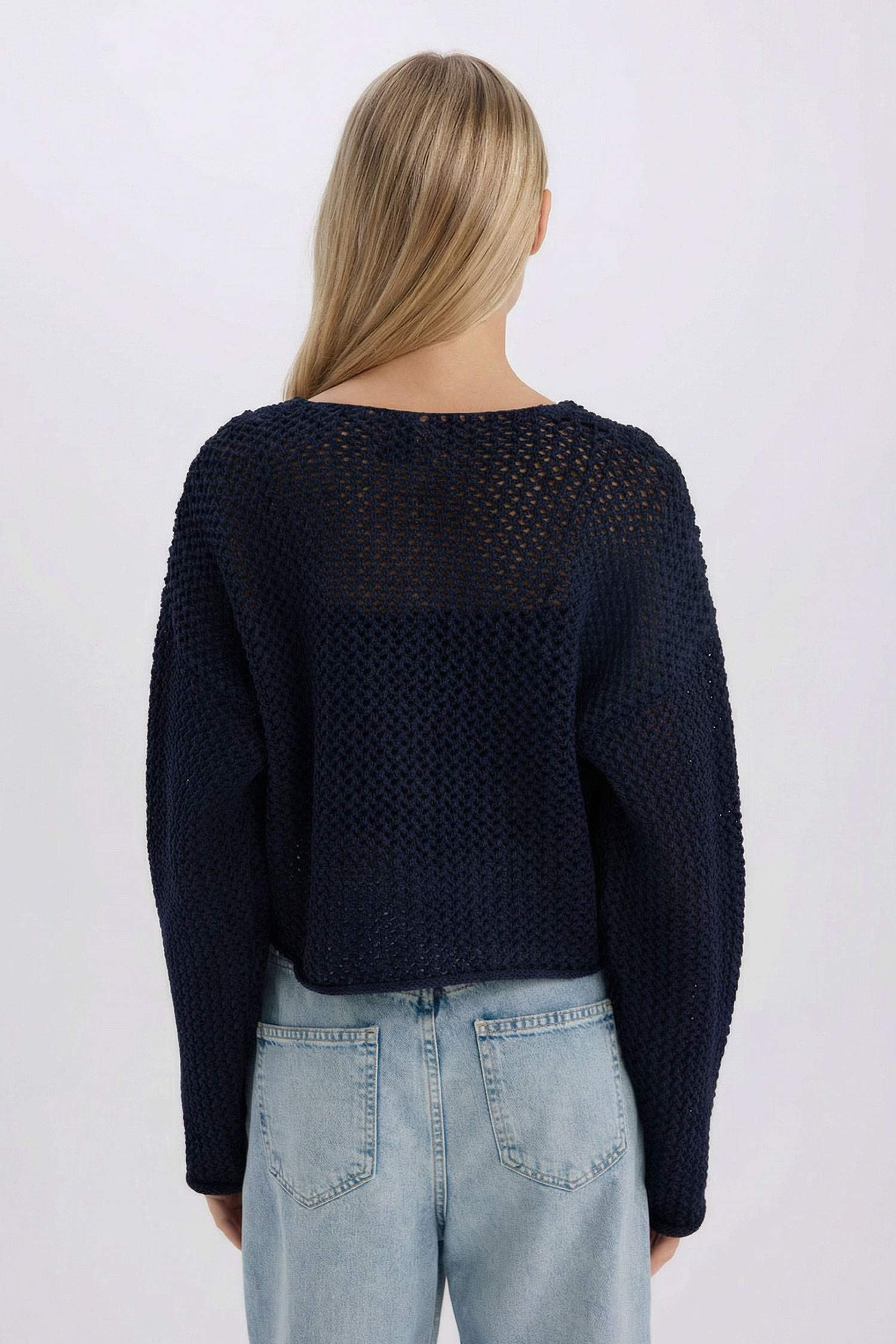 Pull en tricot sans manches décontracté à col rond avec boutons et motif texturé
