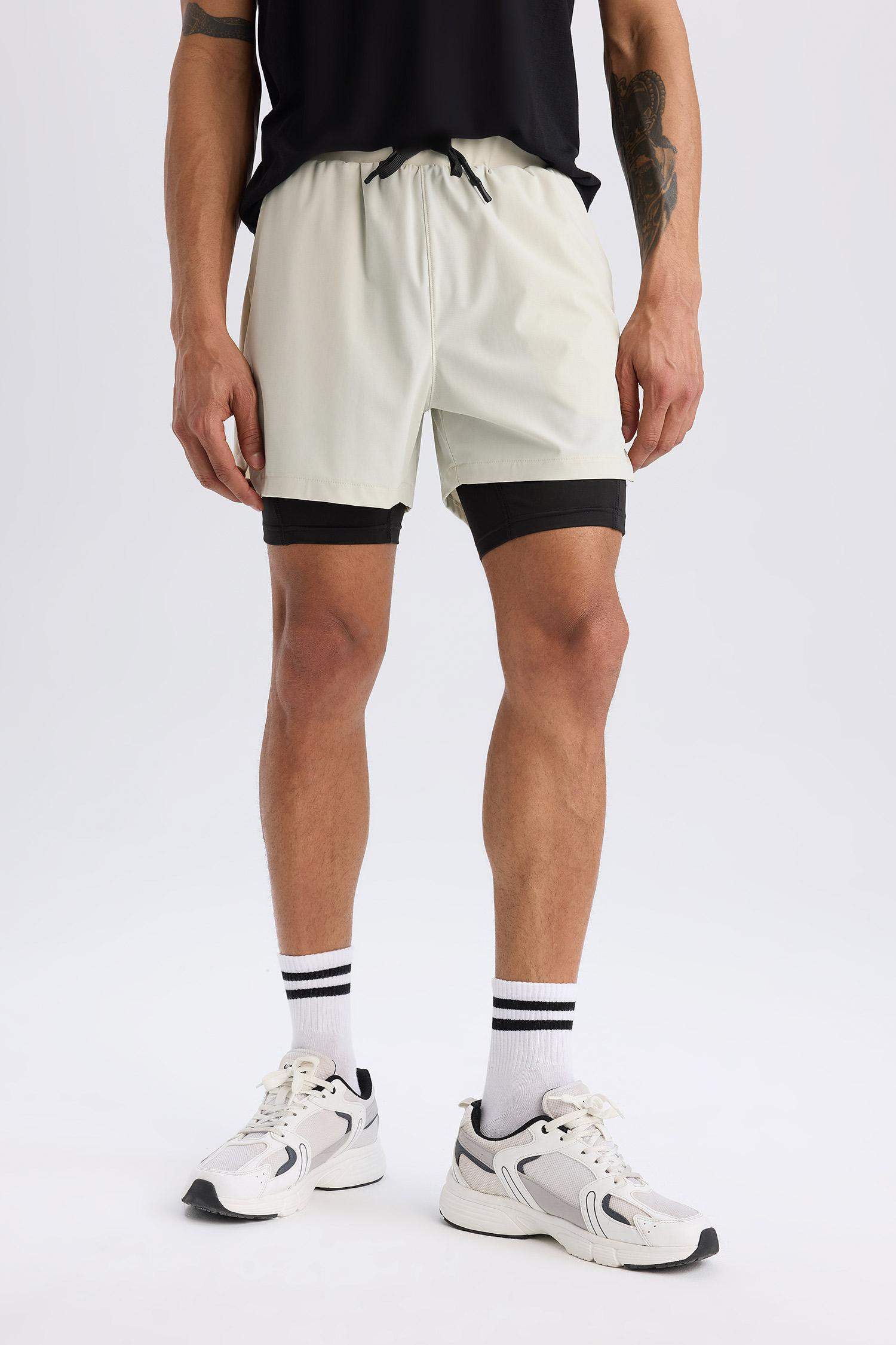 DeFactoFit Slim Fit Dar Kesim Sporcu Taytlı Şort