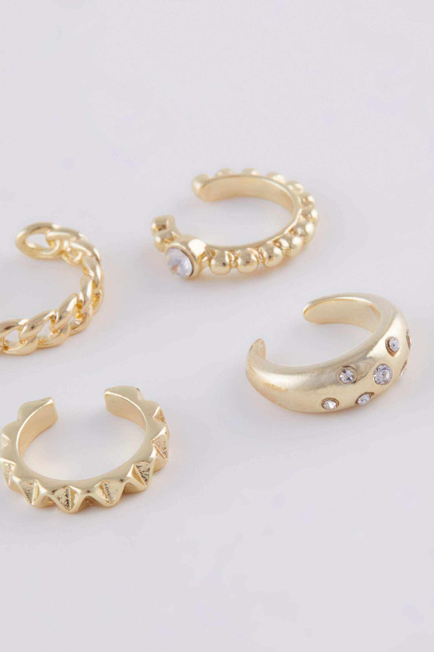 Woman 4 Piece Gold Cartilage Earrings