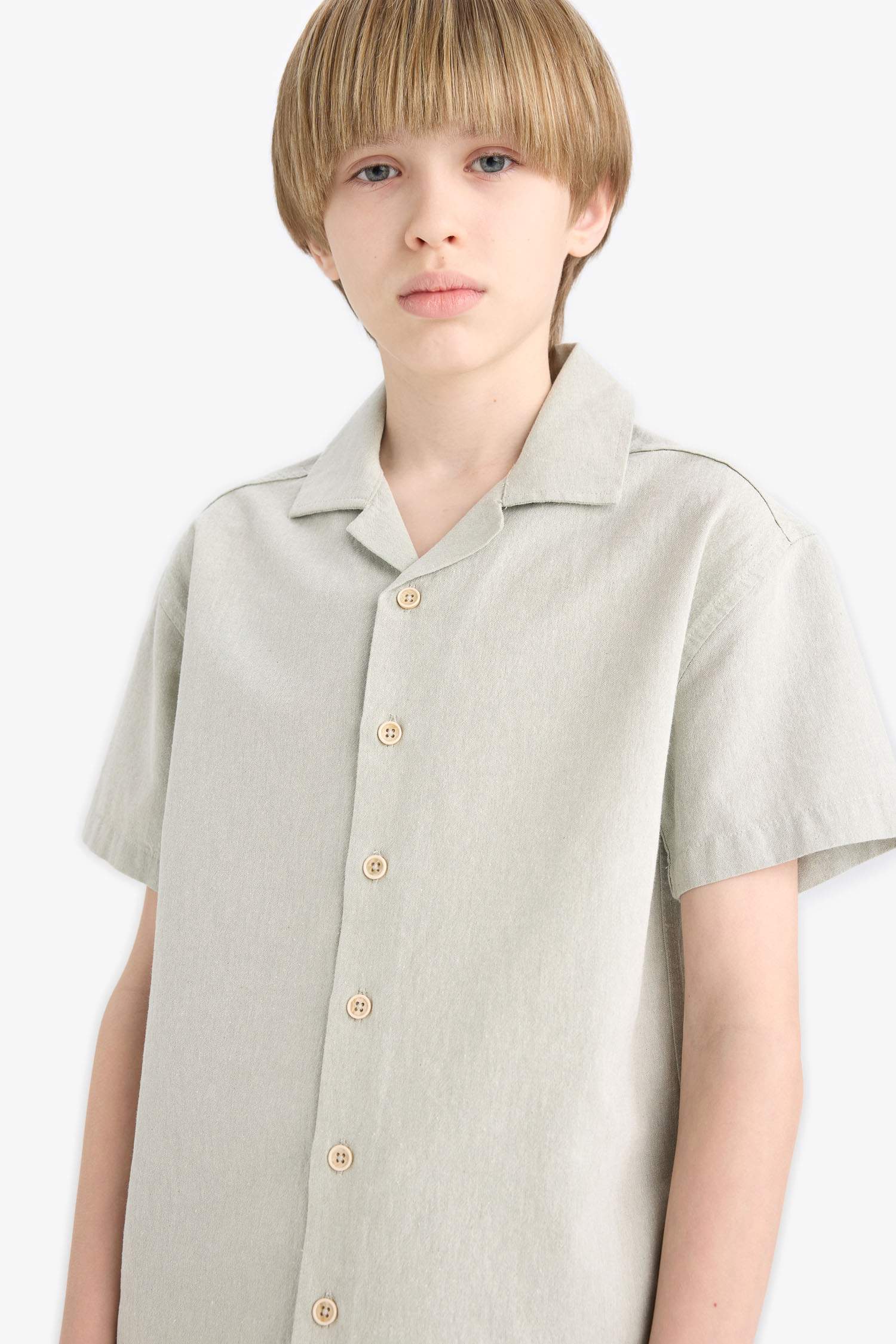 قميص بولو نص كم موسلين اوفر سايز