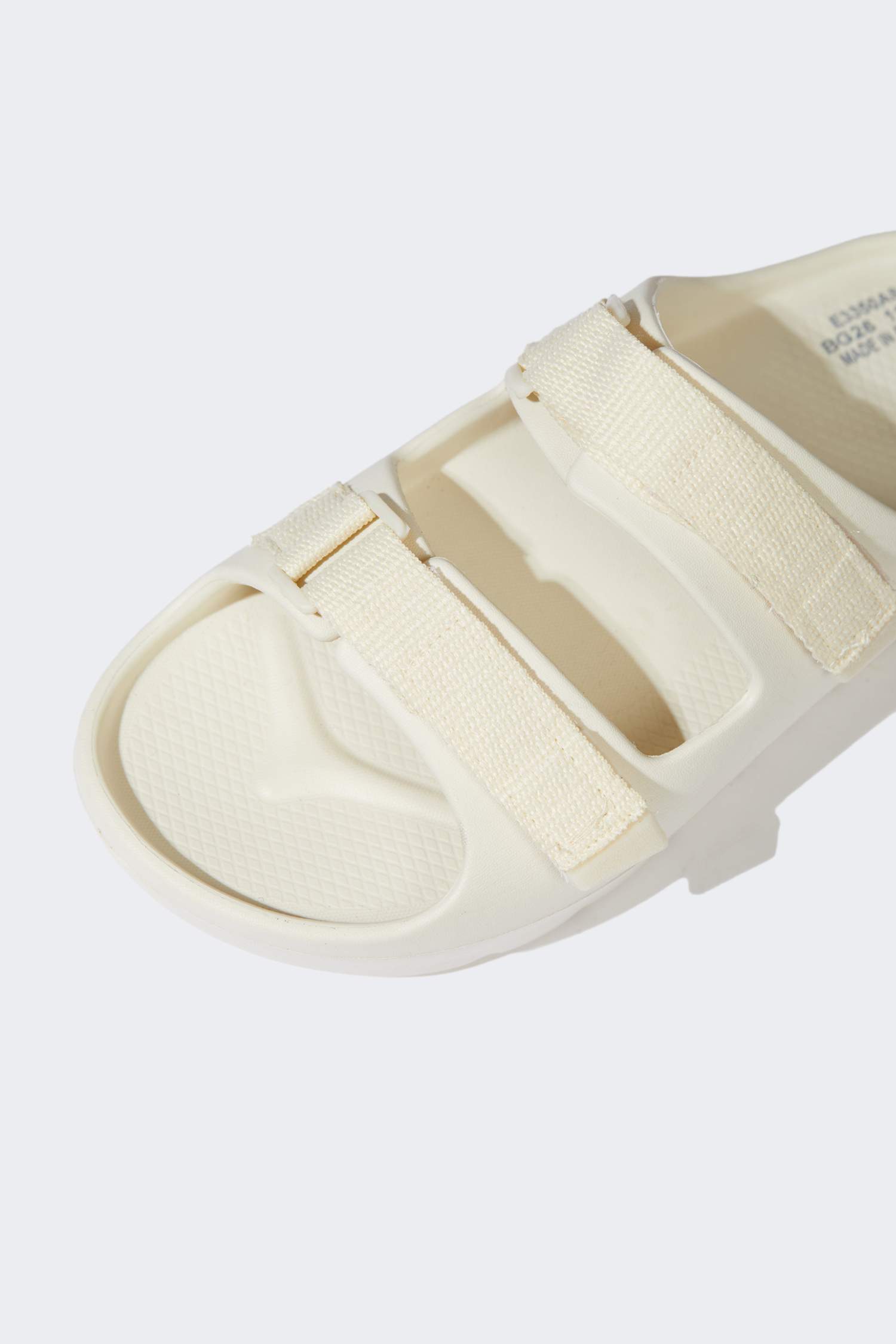 شبشب إيفا بكعب مسطح بشريط مزدوج