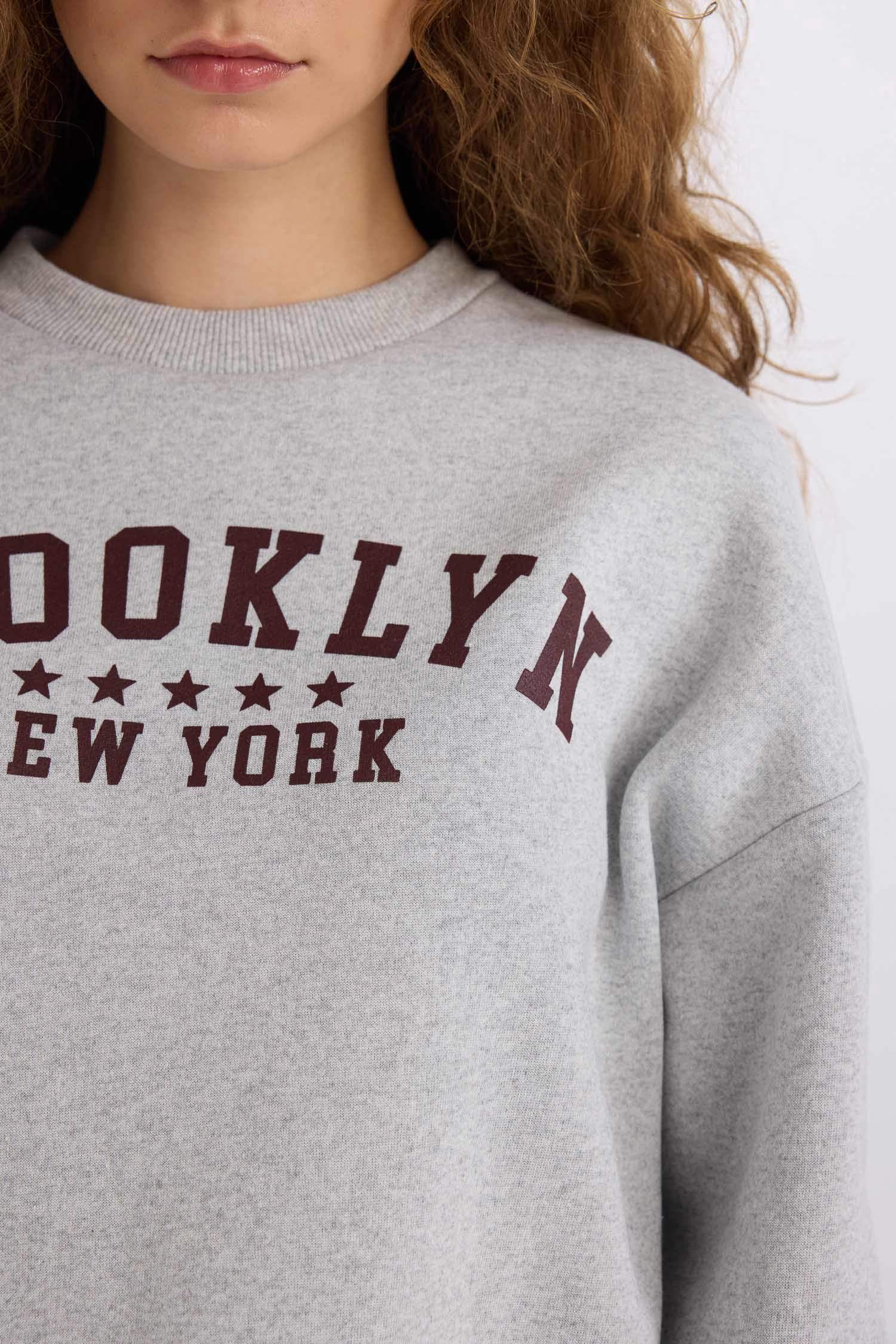 Loose Fit Printed Long Sleeve Sweatshirt