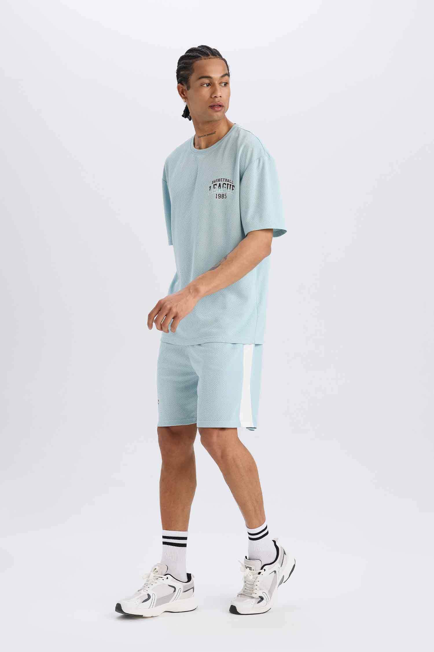 DeFactoFit شورت قصير رياضي قصة عادية مطبوع بجيب من