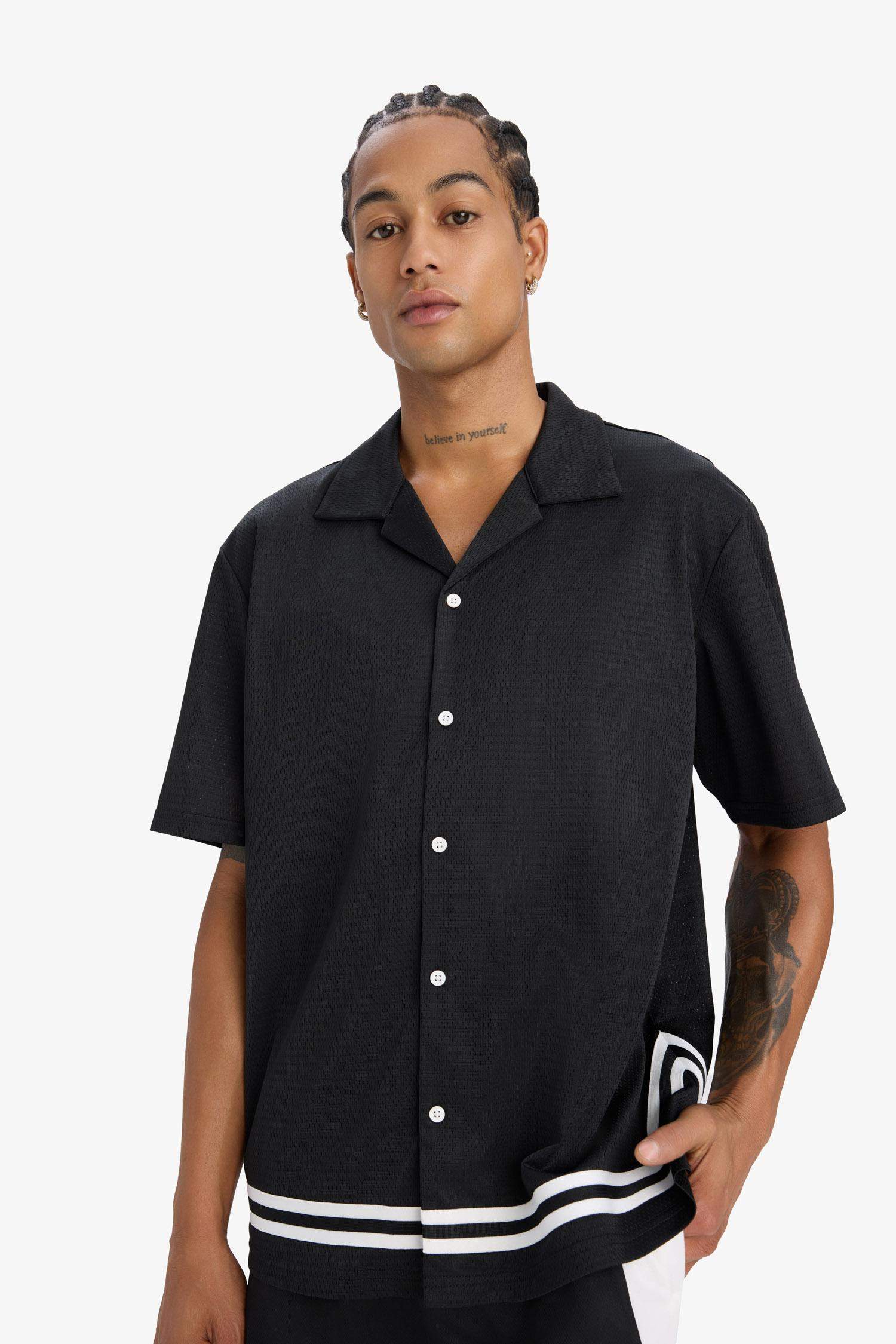 DeFactoFit Hızlı Kuruyan Oversize Geniş Kalıp Bisiklet Yaka Sırt Baskılı Sporcu Kısa Kollu Tişört