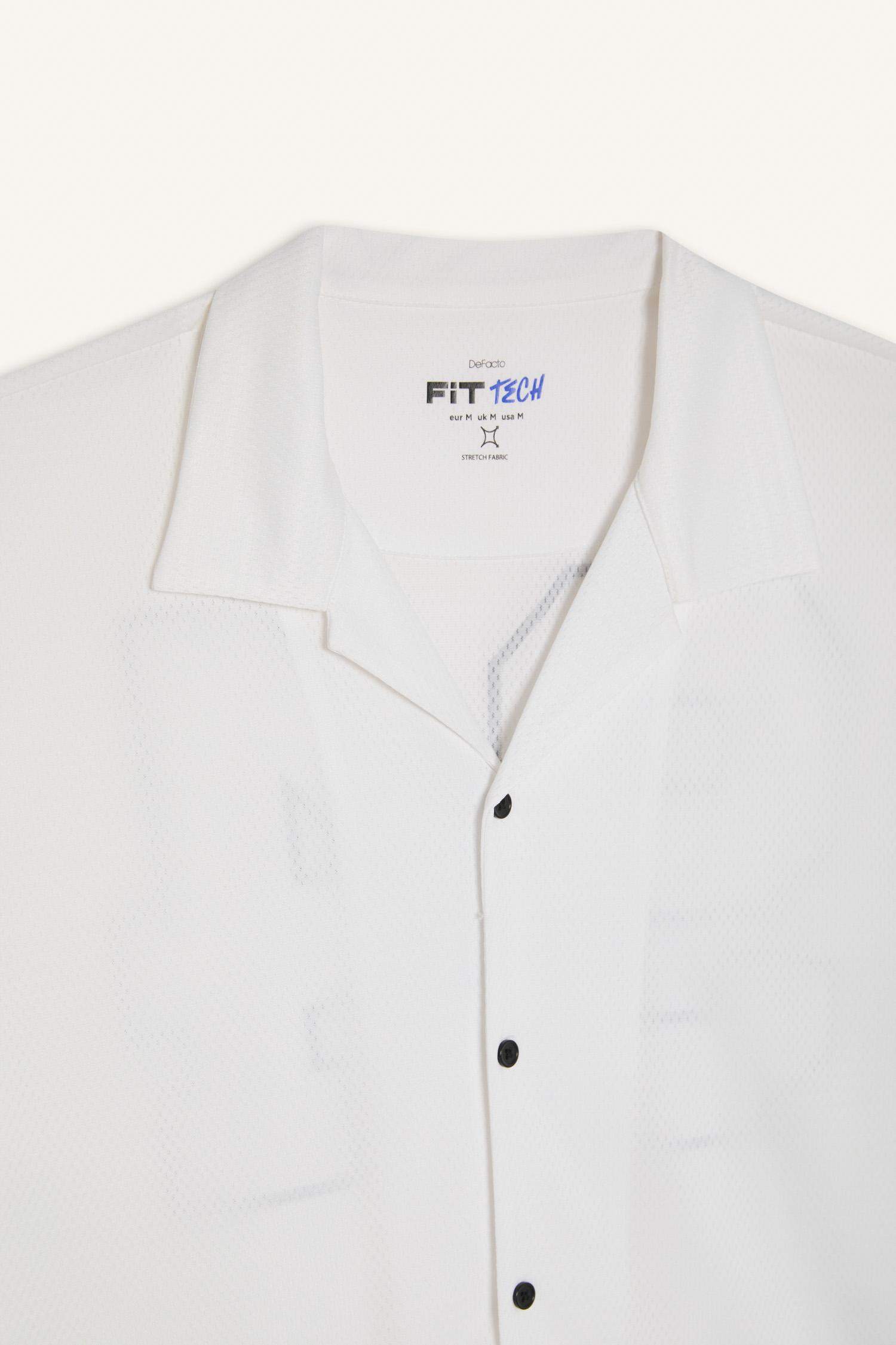 DeFactoFit Hızlı Kuruyan Oversize Geniş Kalıp Bisiklet Yaka Sırt Baskılı Sporcu Kısa Kollu Tişört