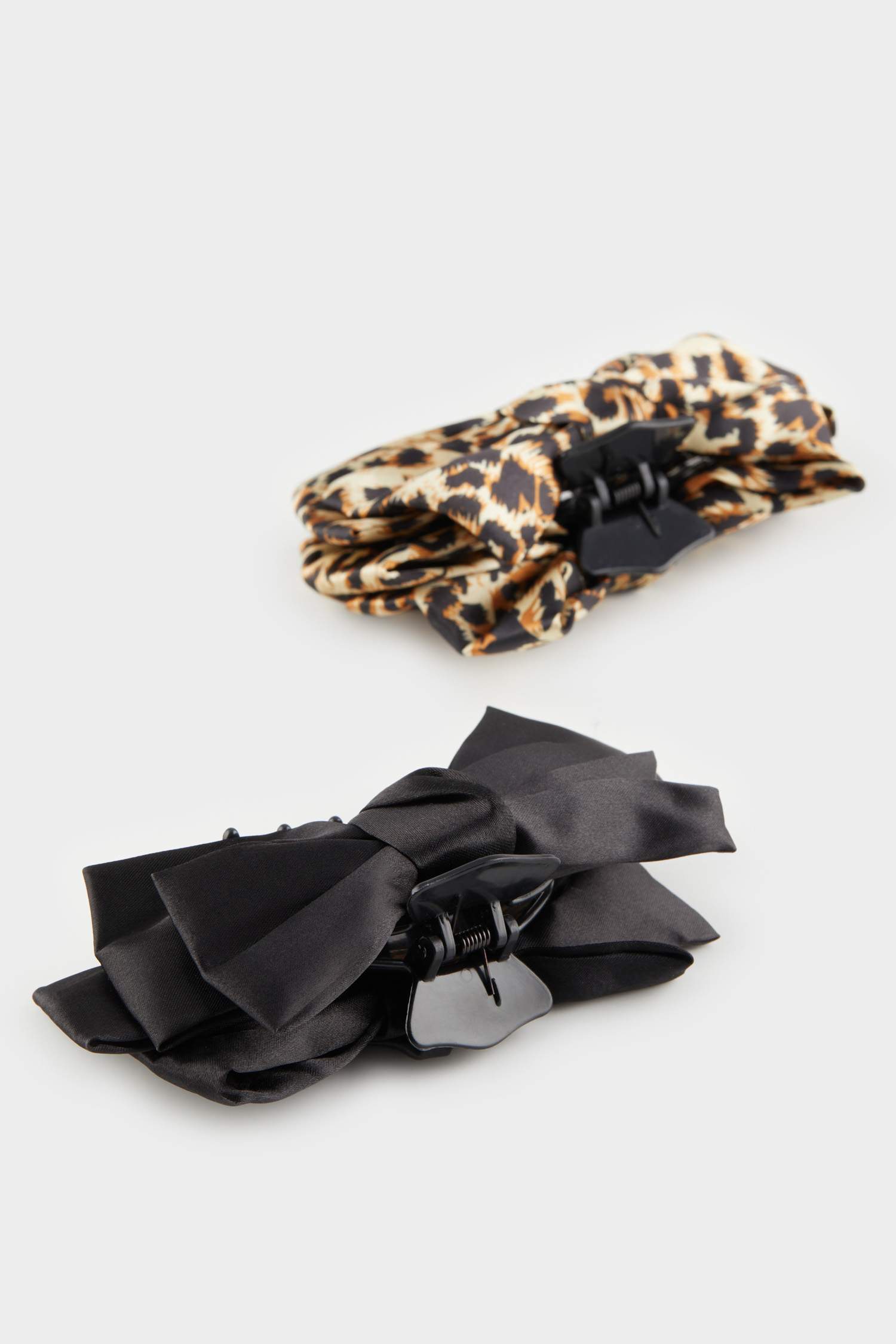 مشبك شعر نسائي اسود وتايجر - قطعتين