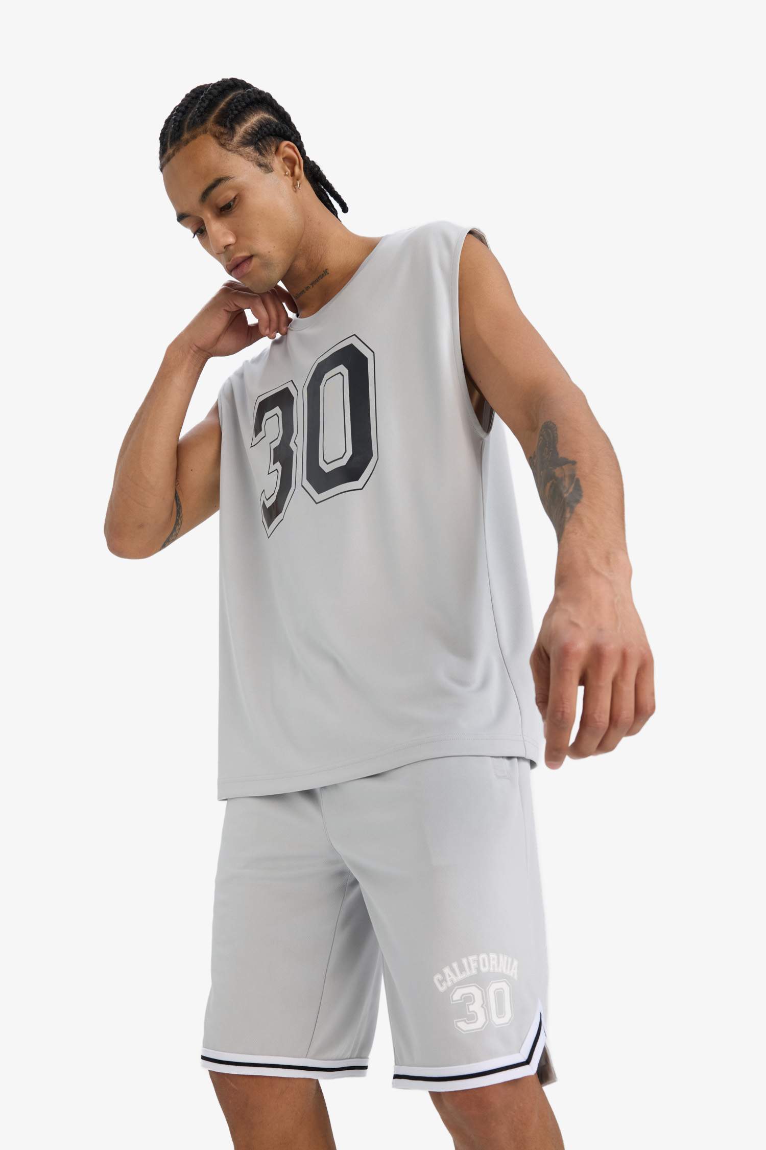 تيشيرت كت اوفر سايز بياخة مستديرة مطبوع من DeFactoFit