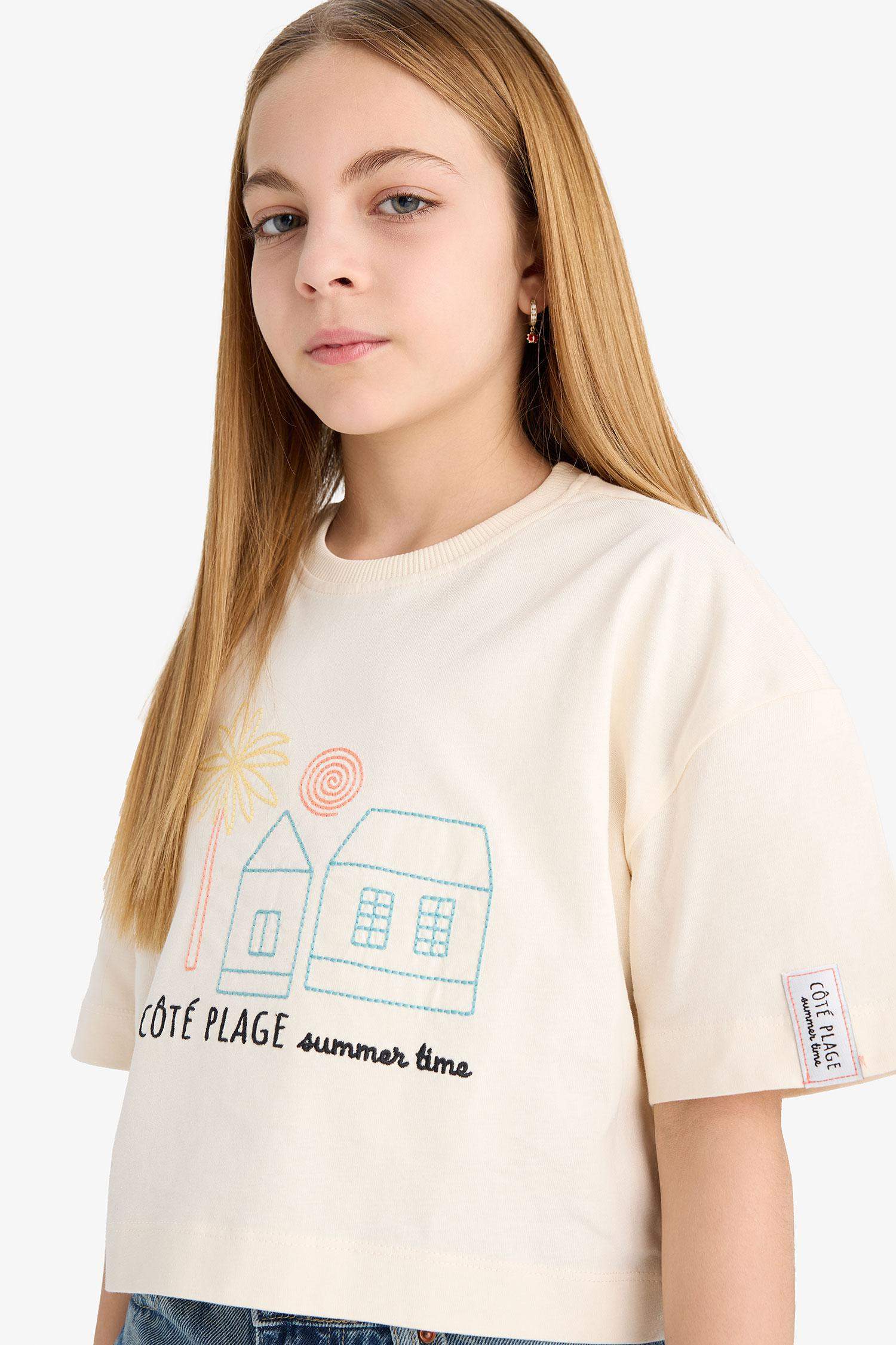 تيشيرت بناتي نص ردن بطبعة شعار أوفر سايز بياخة مستديرة