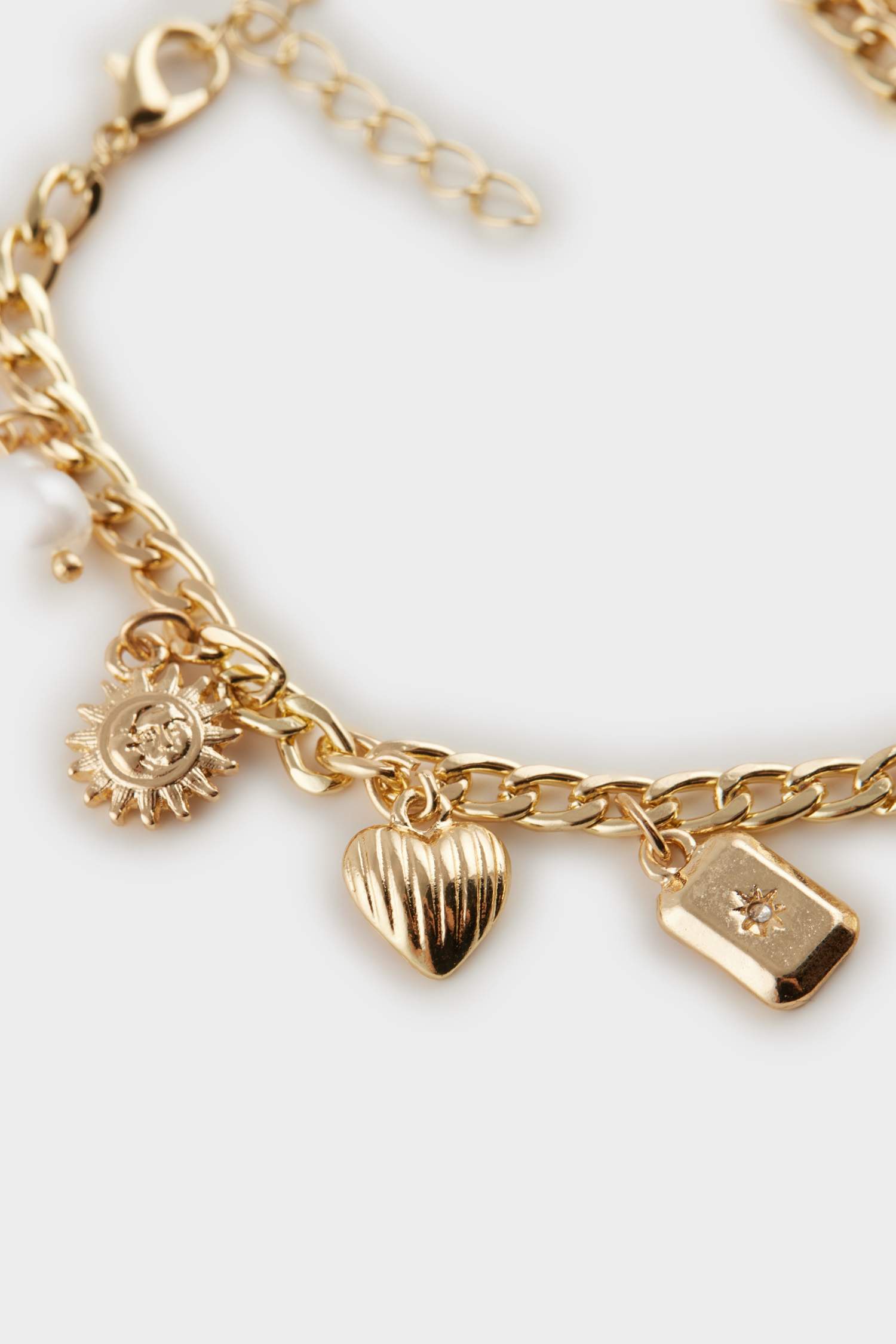 Bracelet doré à motifs pour femme