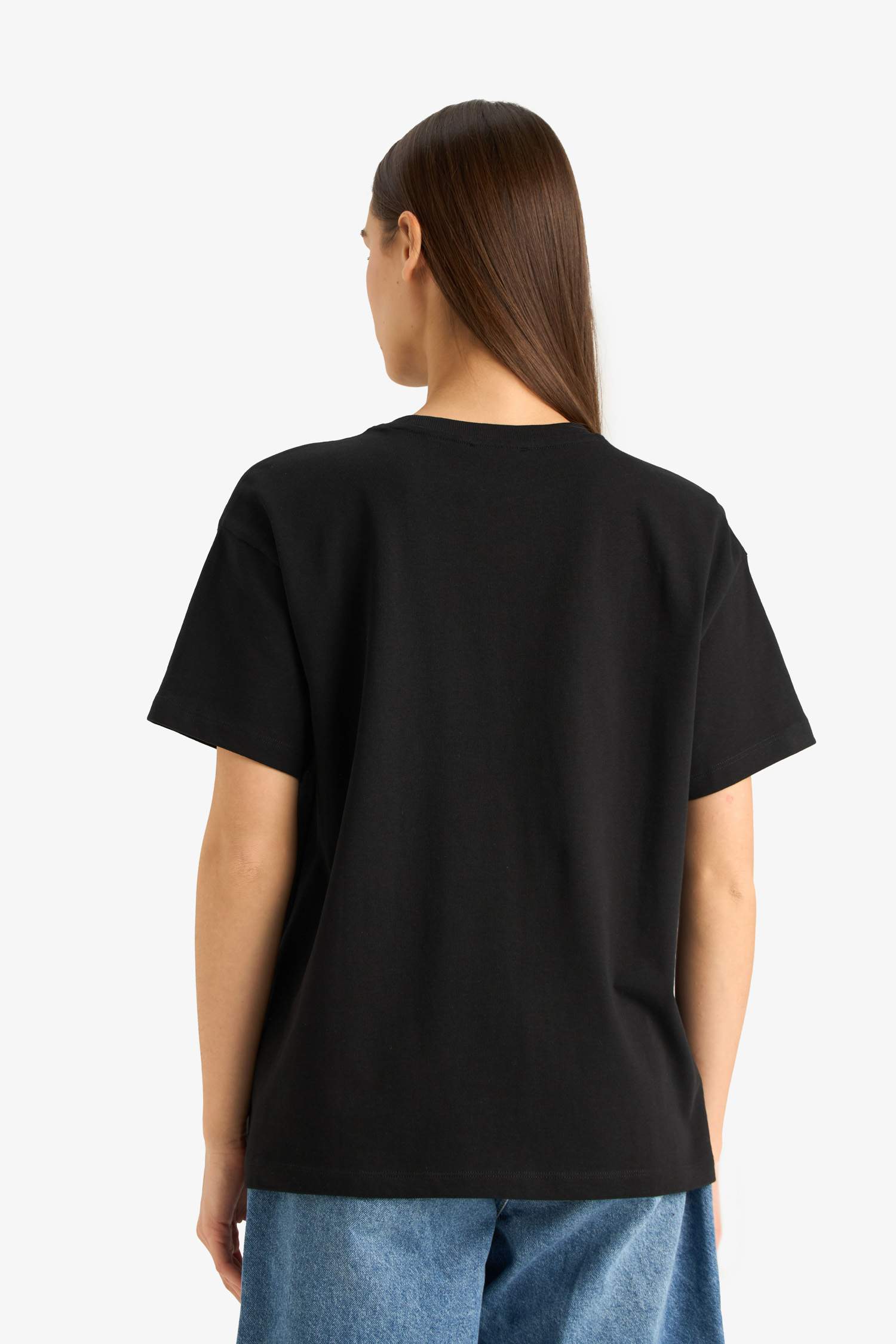 T-shirt blanc oversize à manches courtes et col rond