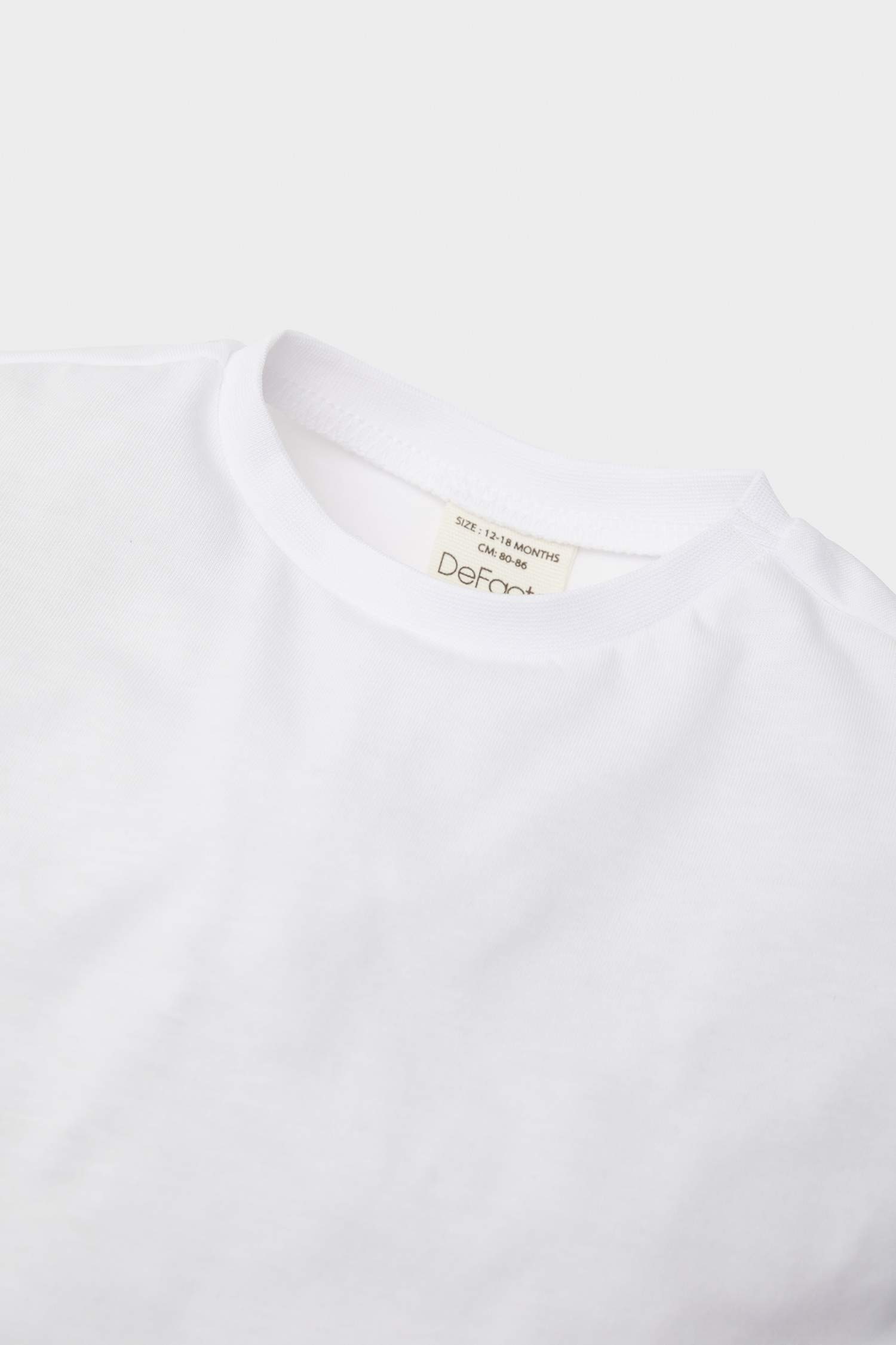 تيشيرت بيبي بناتي أبيض كم طويل قصة عادية بياقة مستديرة