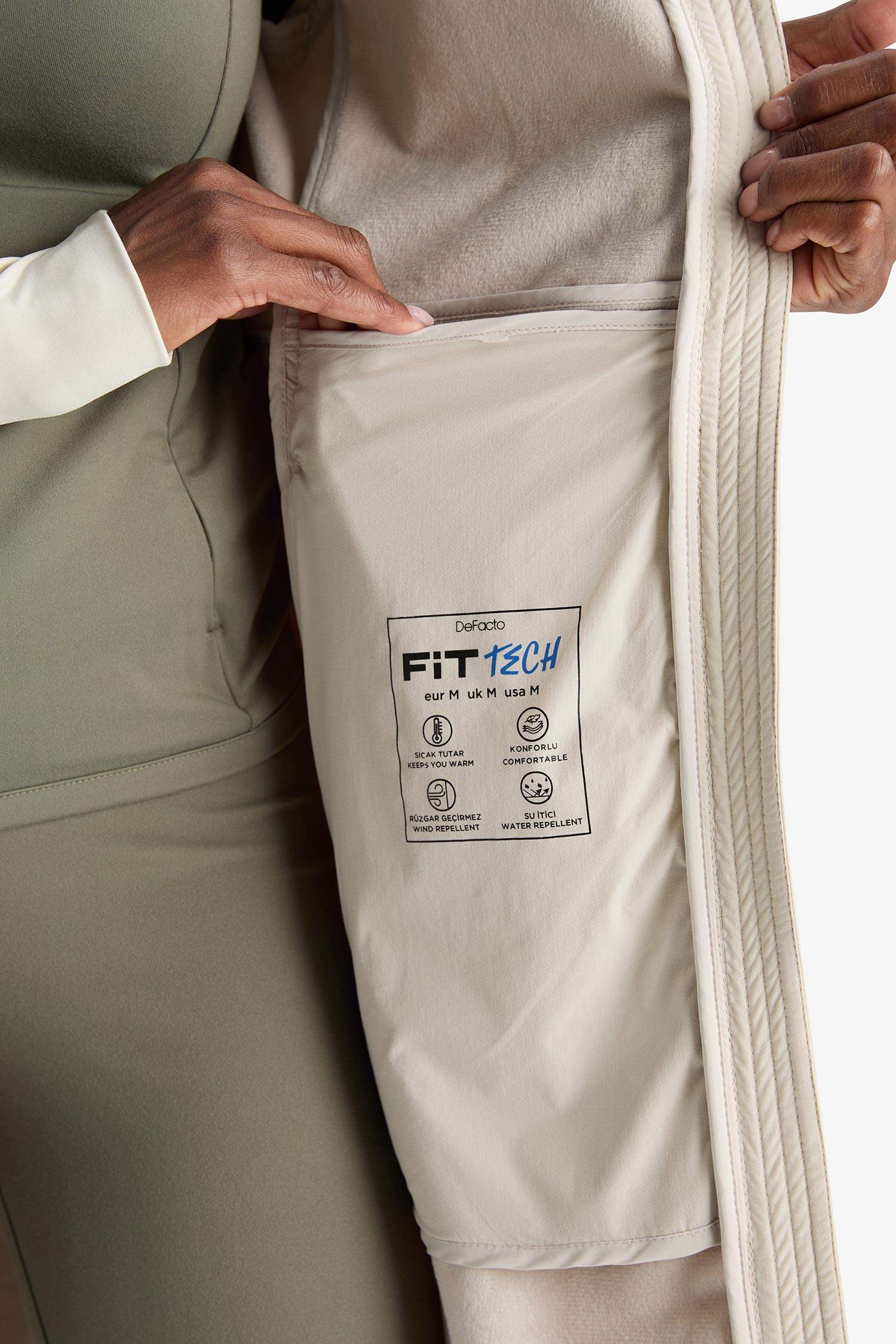 معطف سليم فيت بغطاء للرأس طارد للماء من DeFactoFit