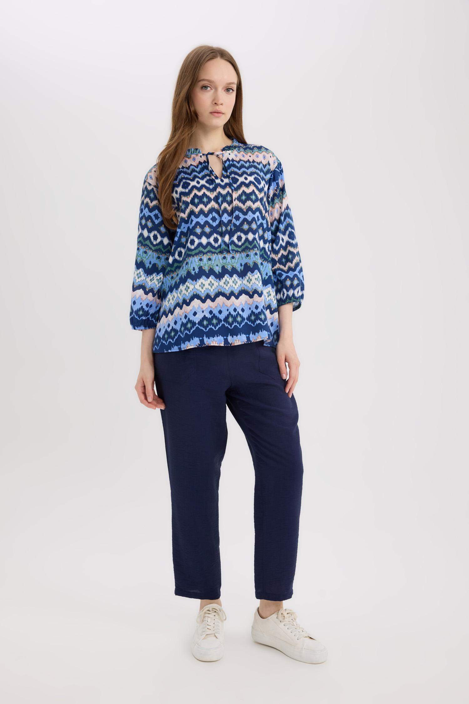 قميص ردن طويل منقوش قصة عادية بياخة V