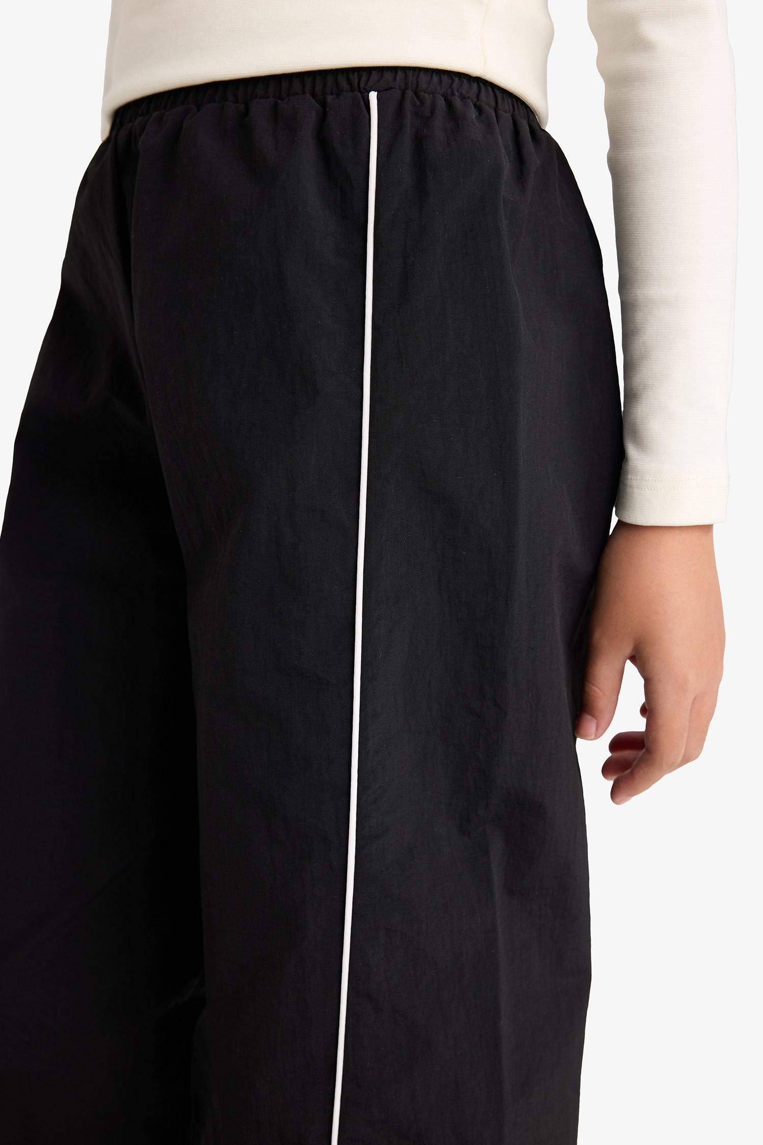 بنطرون بناتي باراشوت برجل واسع وايد ليج