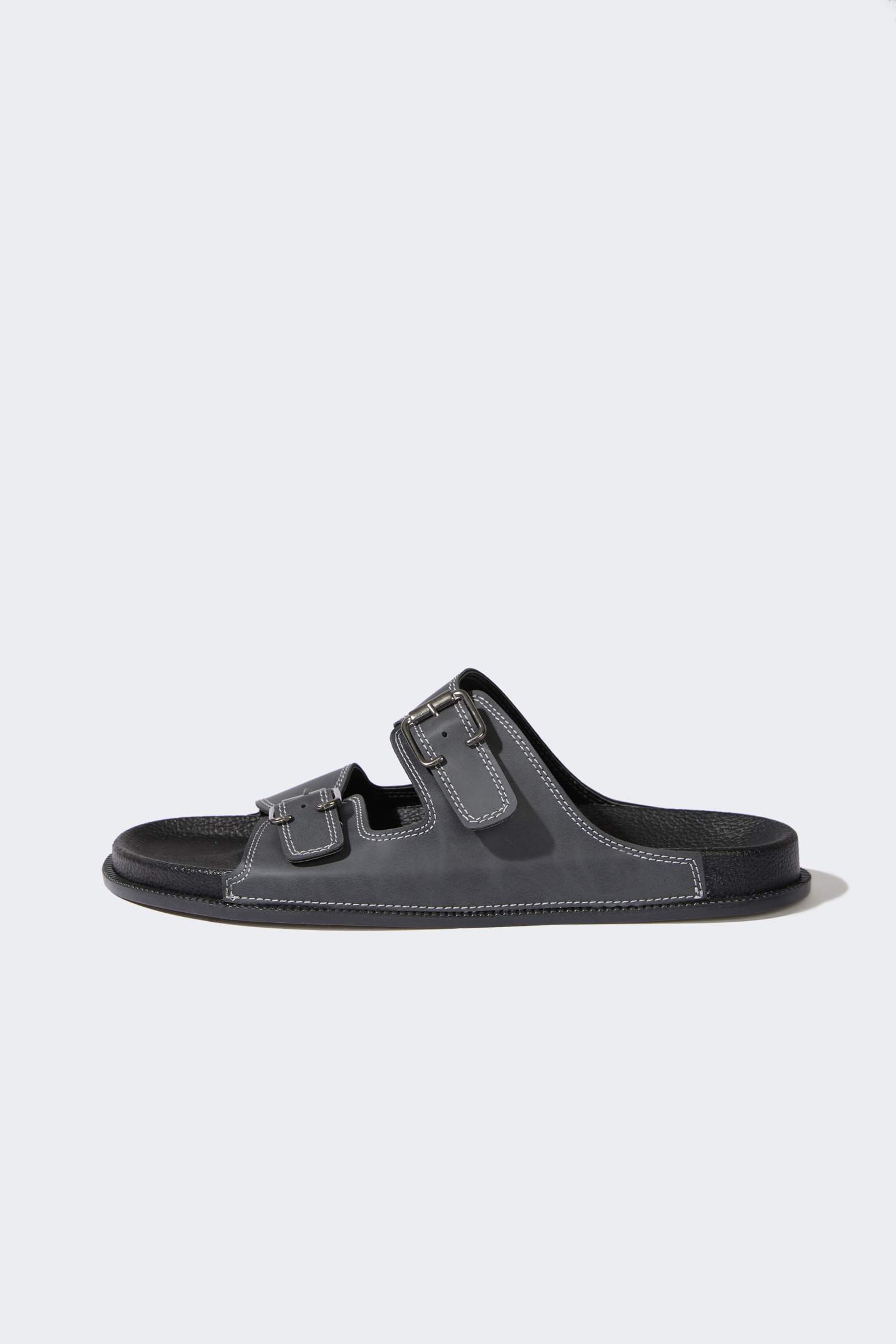 شبشب رجالي جلد صناعي بكعب مسطح بشريط مزدوج