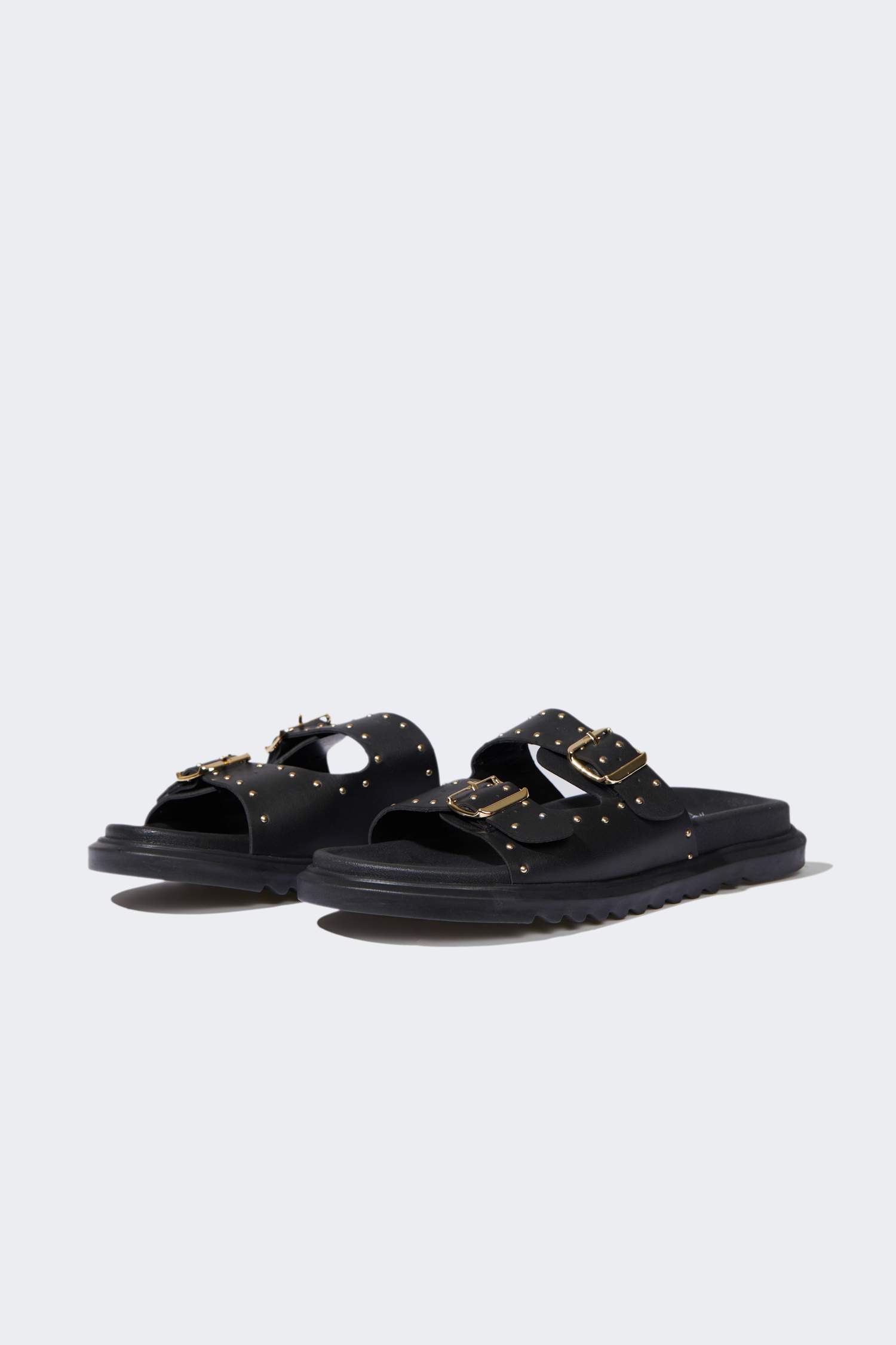 شبشب نسائي جلد صناعي بكعب مسطح بشريط مزدوج