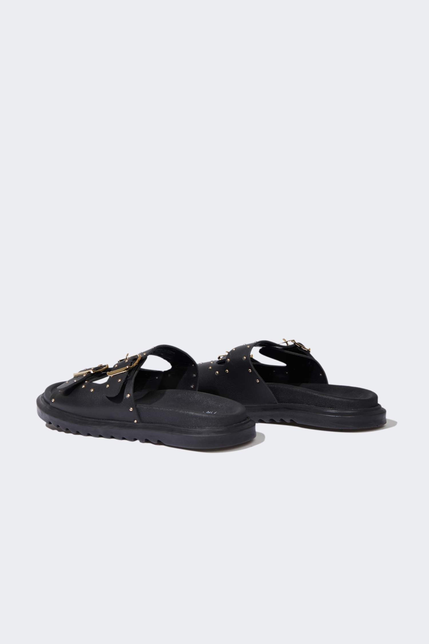 شبشب نسائي جلد صناعي بكعب مسطح بشريط مزدوج