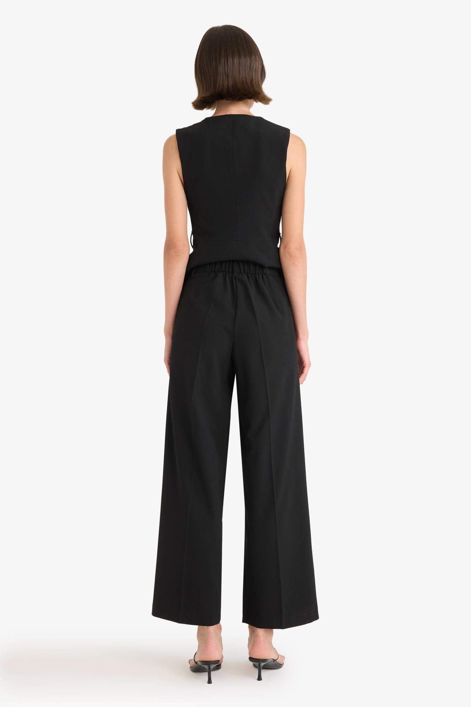 Широкие тканевые брюки с обычной посадкой на талии