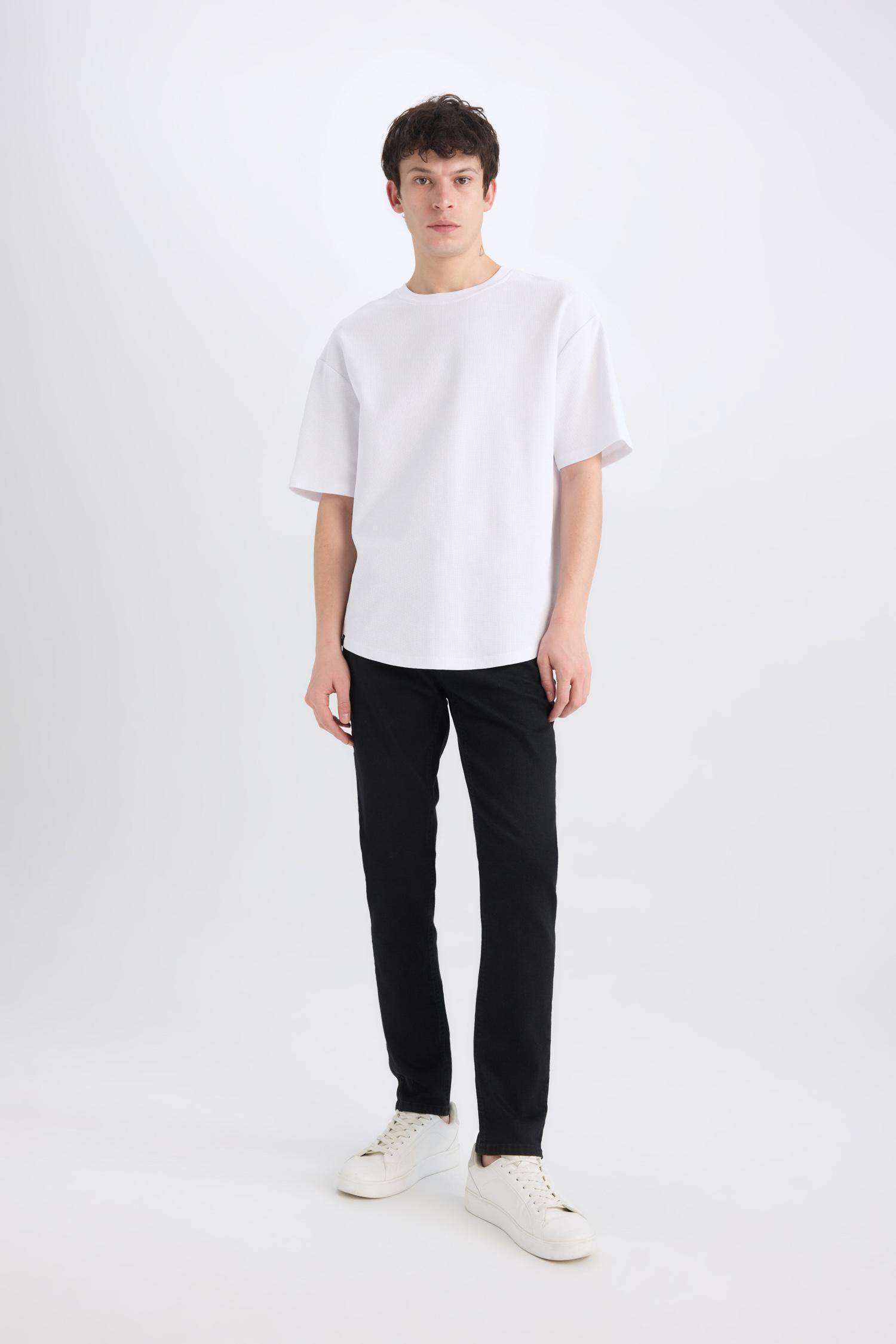 بنطلون جينز كارلو سكيني فيت برجل ضيق وخصر عادي أسود