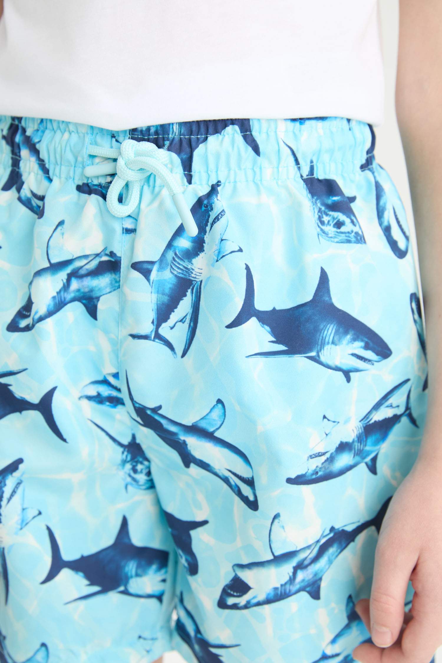 شورت بحر اولادي بطبعة سمك