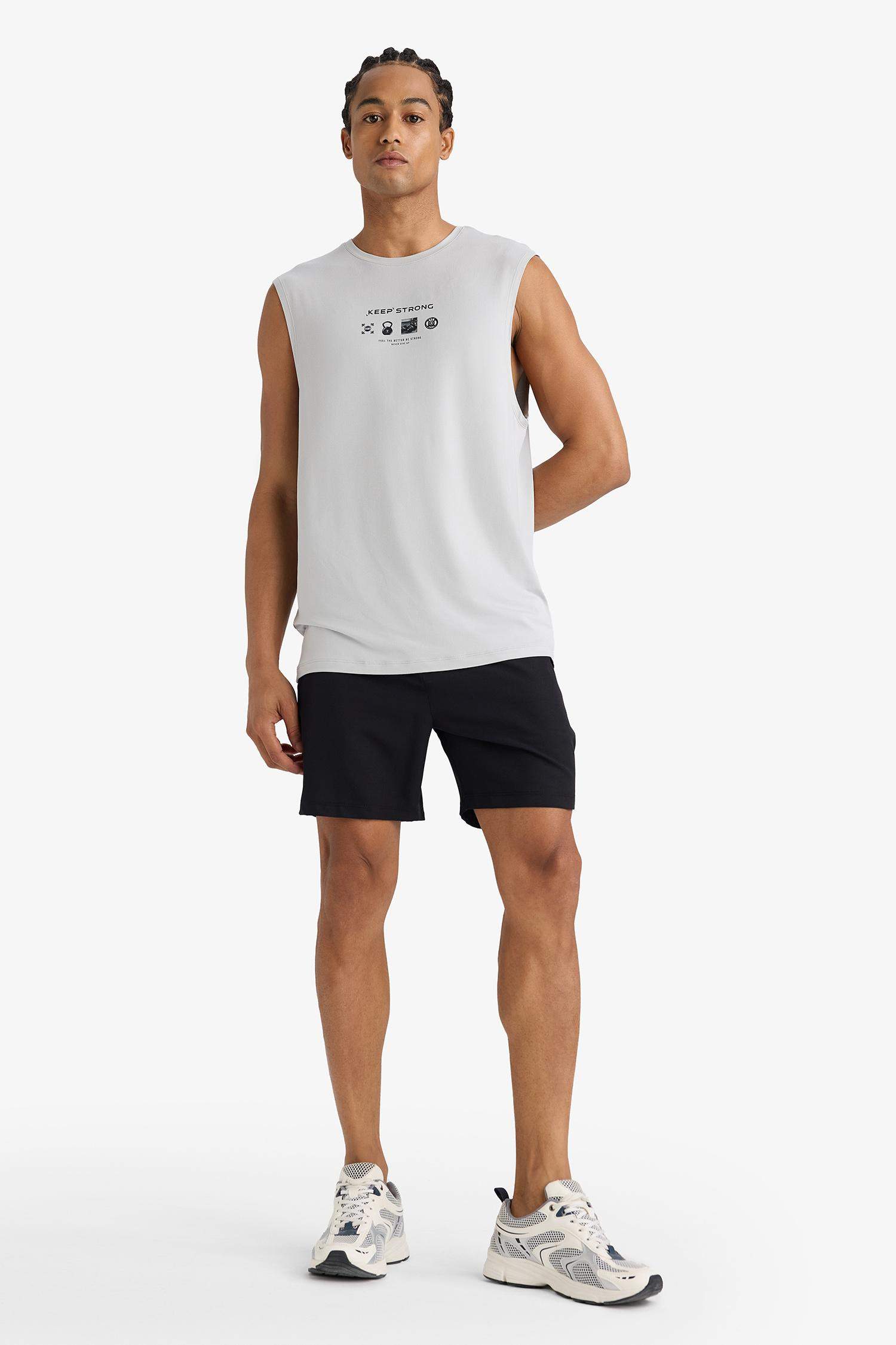 DeFactoFit Standart Fit Sporcu Cepli Dokuma Şort